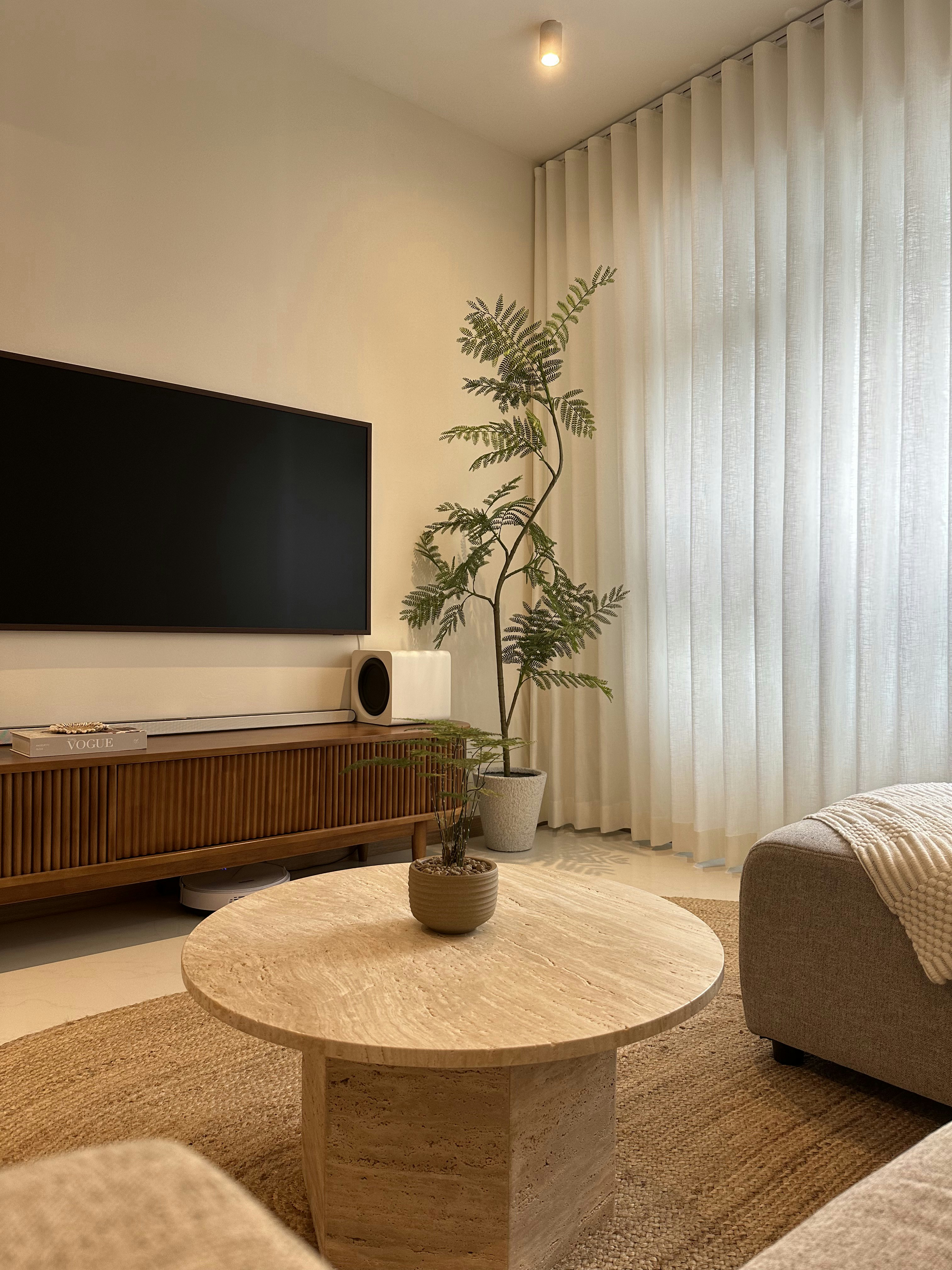 Living room - our fave spot in the house! - Modern living room, minimalist decor, large flat-screen TV, wooden console