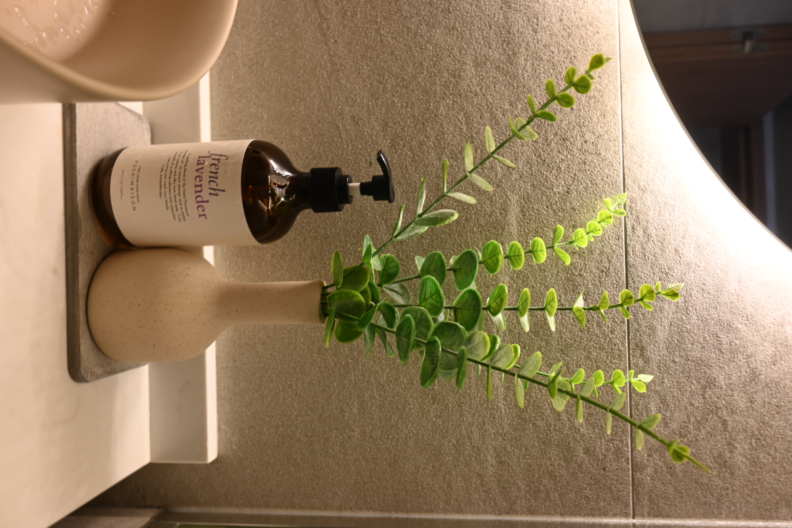 House plants - can you tell if they are real or fake?  - vibrant green plant, natural lighting, indoor setting, bathroom