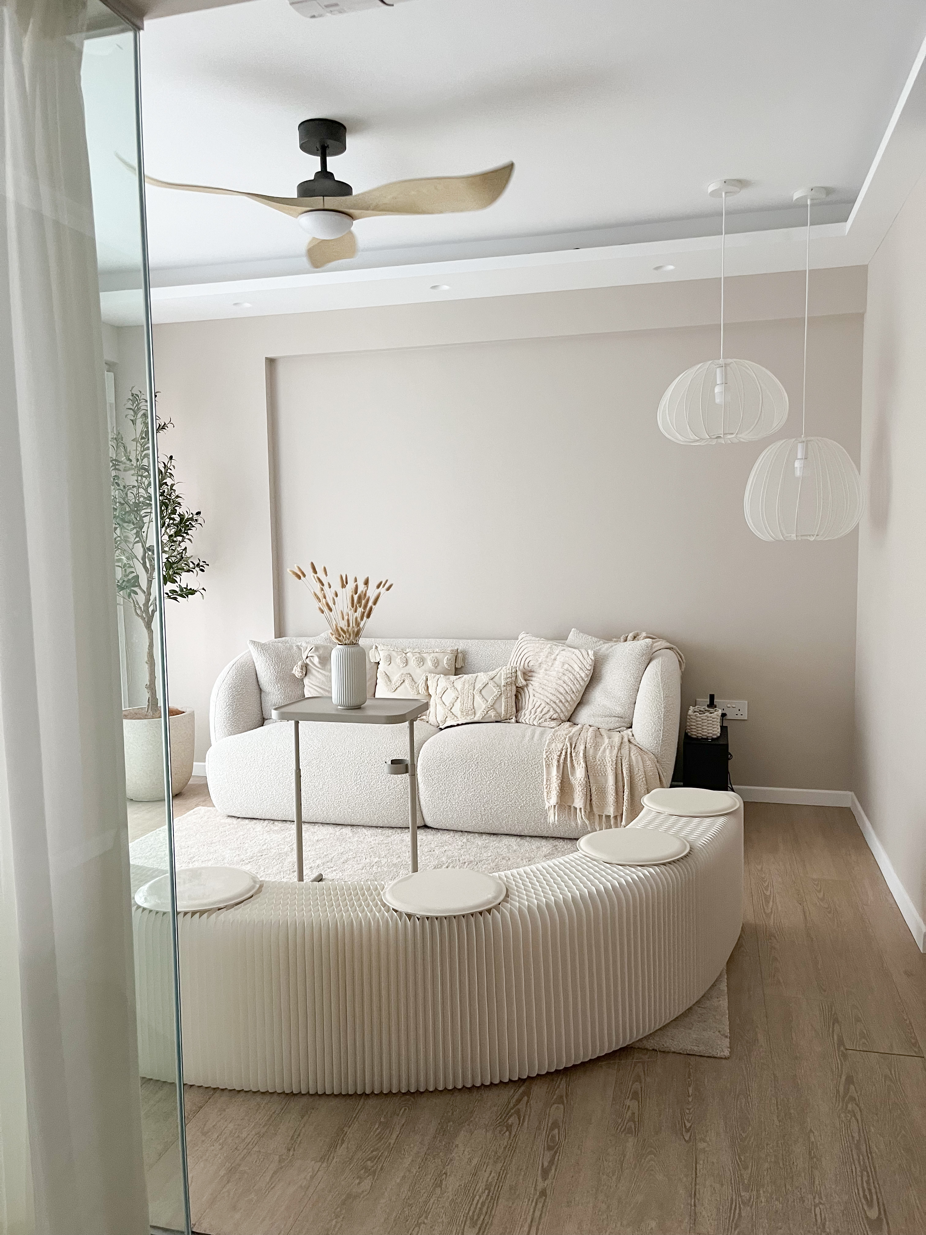 Living Room: Heart of the Home - Modern minimalist living room, neutral color palette, cozy seating area, plush white sofa