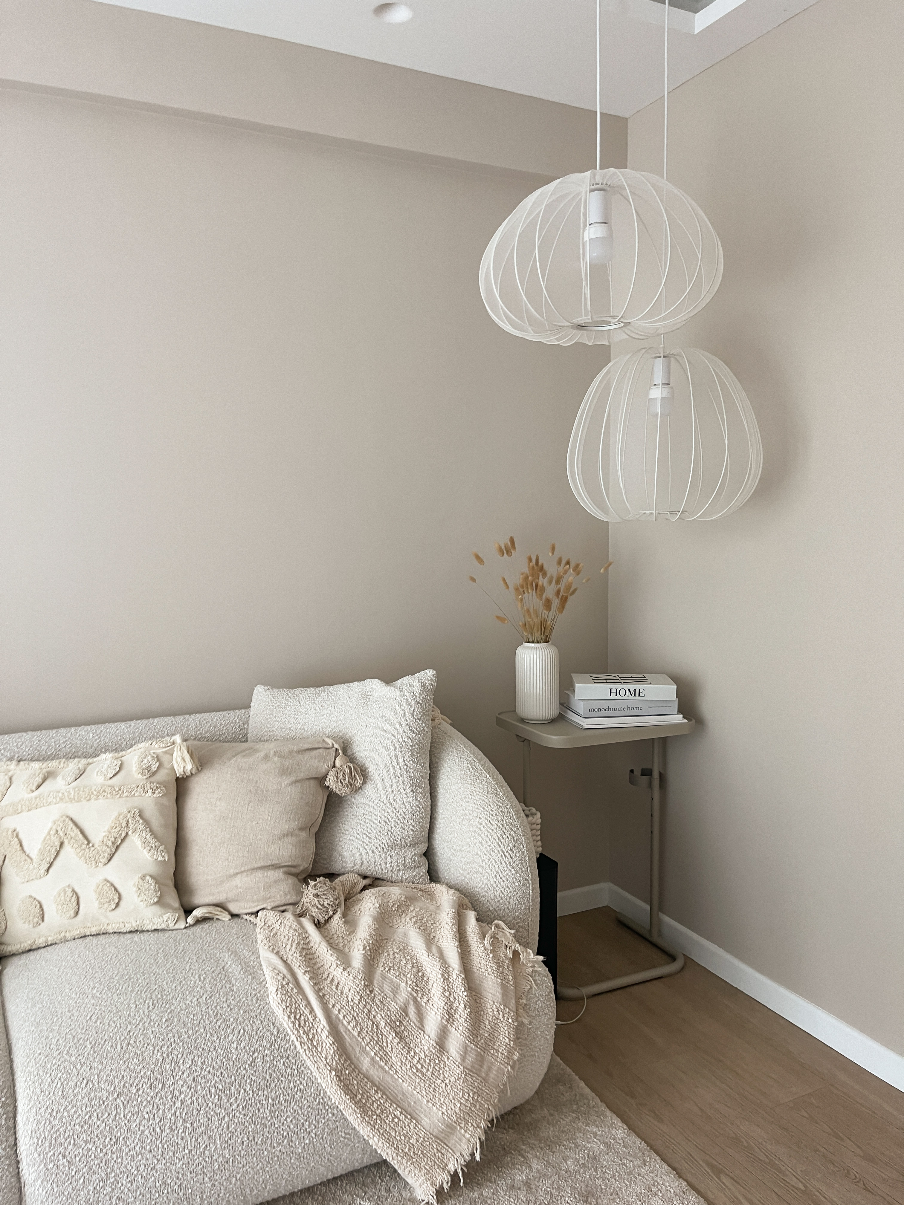 Living Room: Heart of the Home - Modern minimalist living room, neutral color palette, beige and white decor, cozy sofa