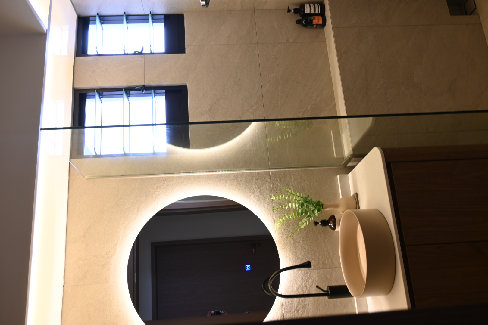 Bali inspired bathrooms  - Modern bathroom interior, minimalist design, large windows, beige tiles, sleek fixtures, glass