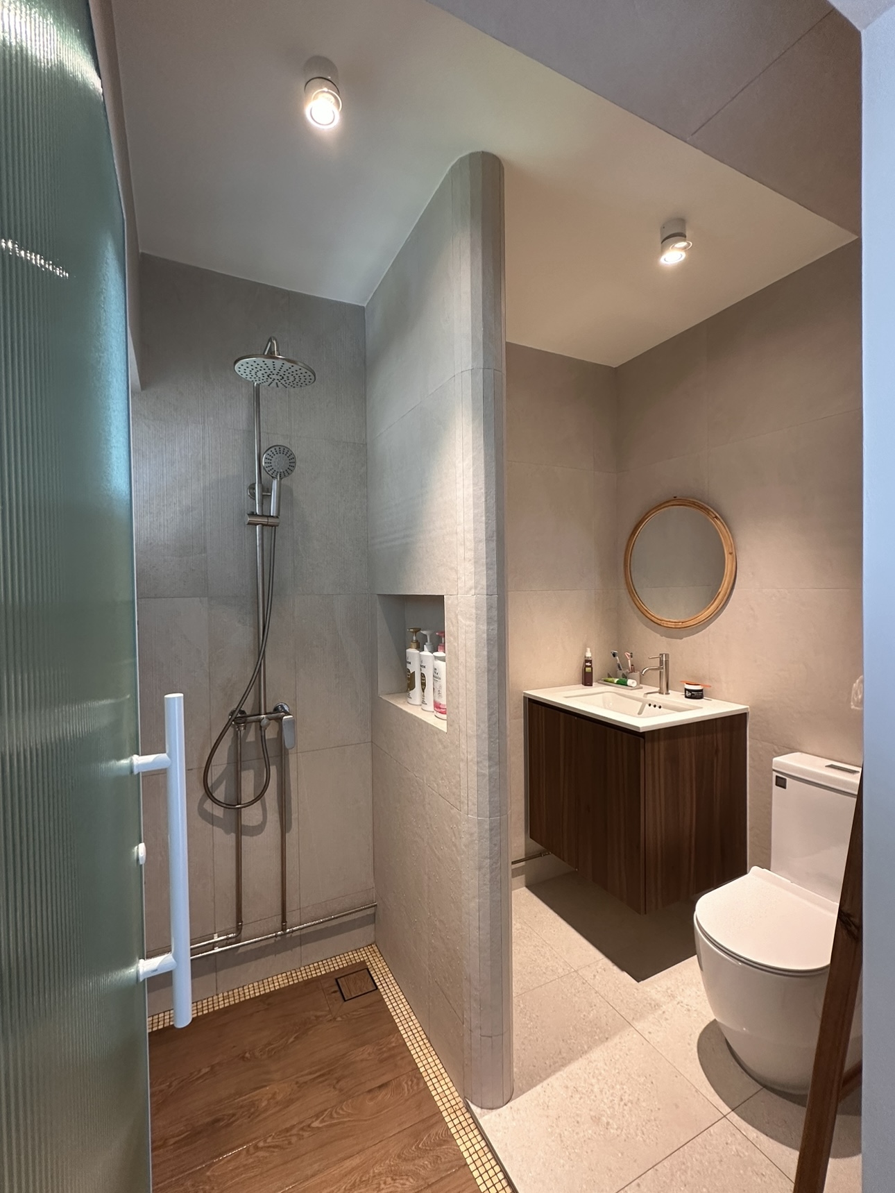 Join us in building our 3 bathrooms! - Modern bathroom with sleek design, beige tiles, wooden flooring, freestanding bathtub