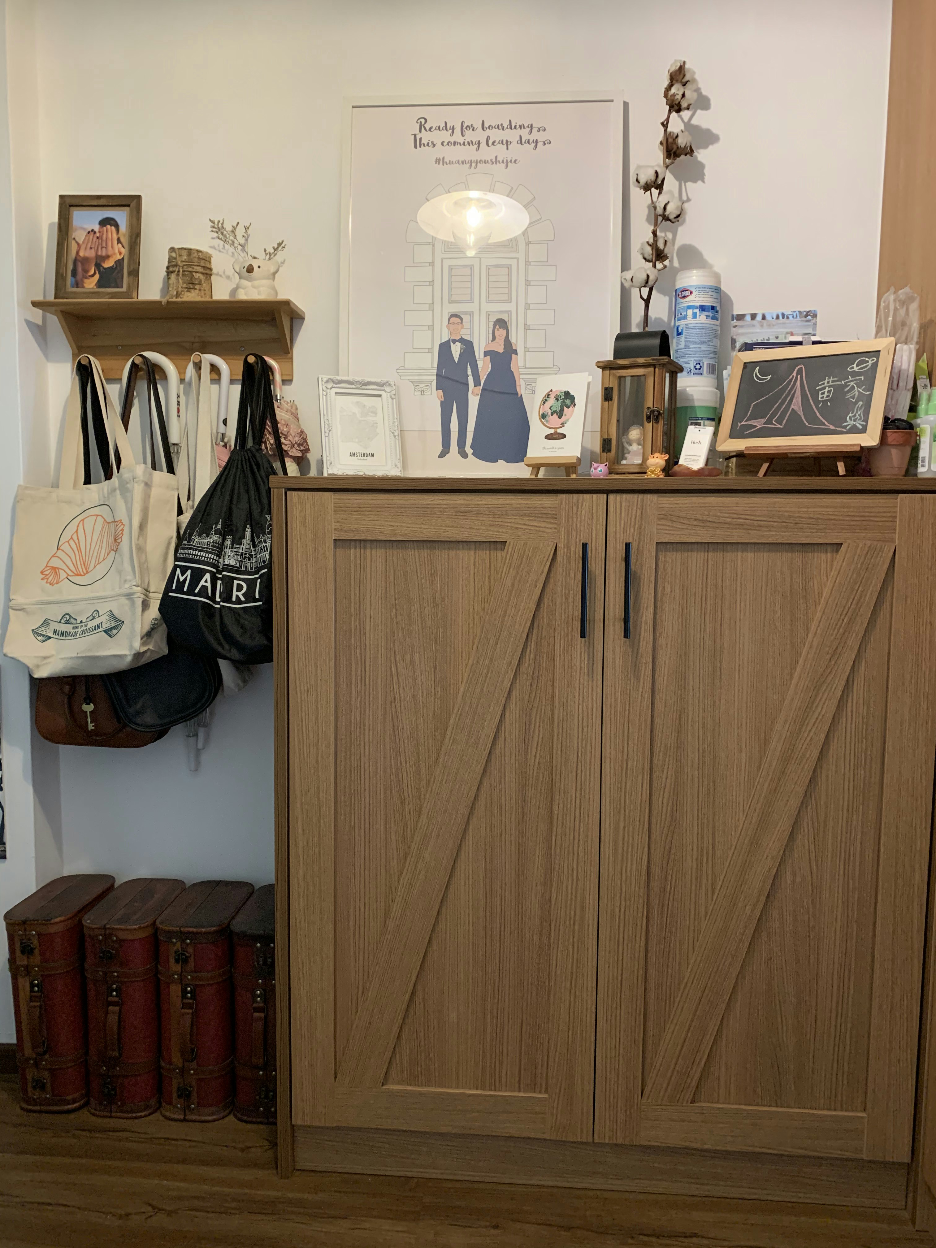 Enter our 4-rm Classic Farmhouse in Telok Blangah - Wooden cabinet, wooden door, red leather-bound books, wooden shelf