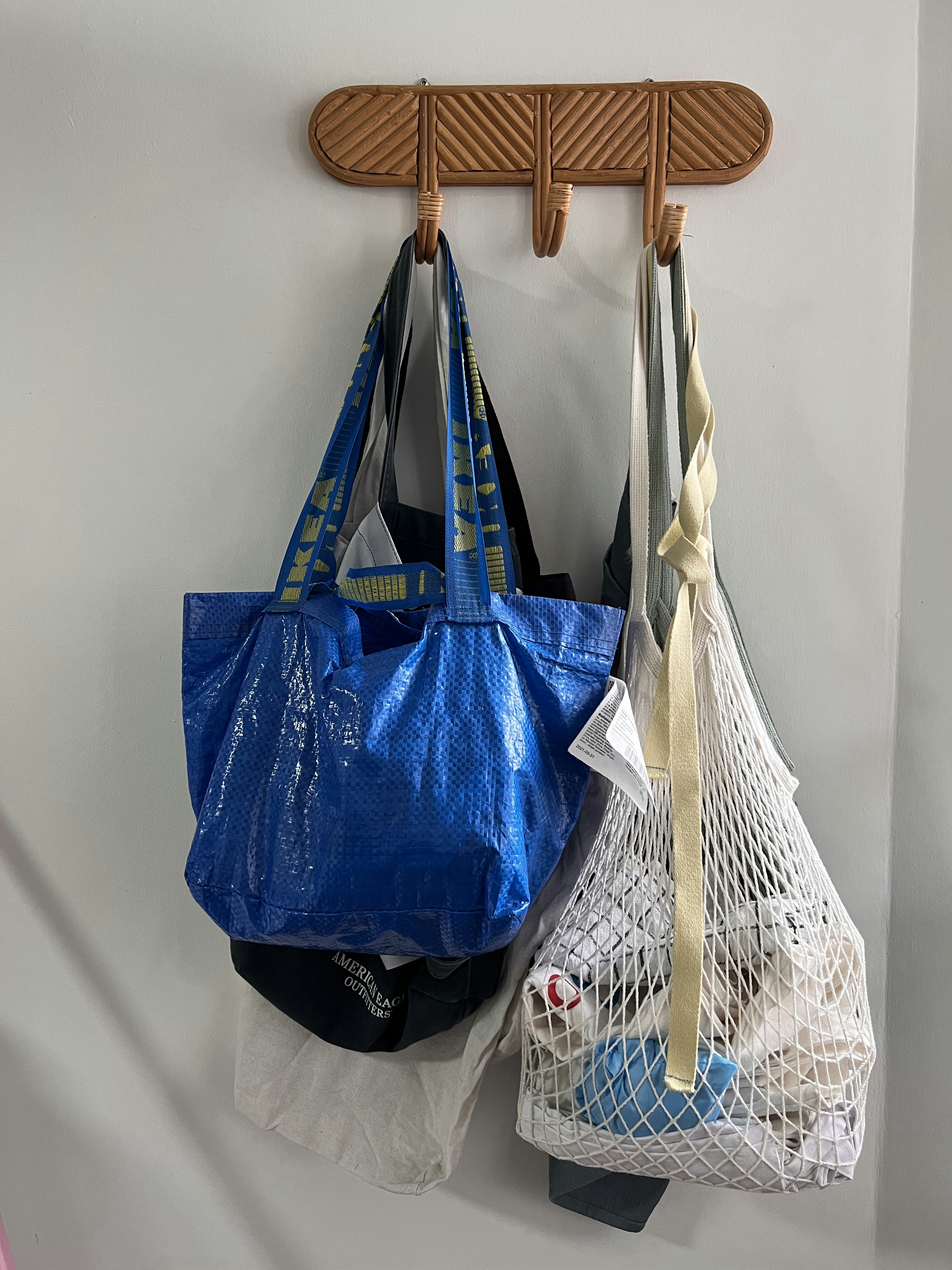 4Rm HDB Classic Farmhouse Open Concept Service Yard - blue reusable bags, hanging on wooden rack, household waste bags