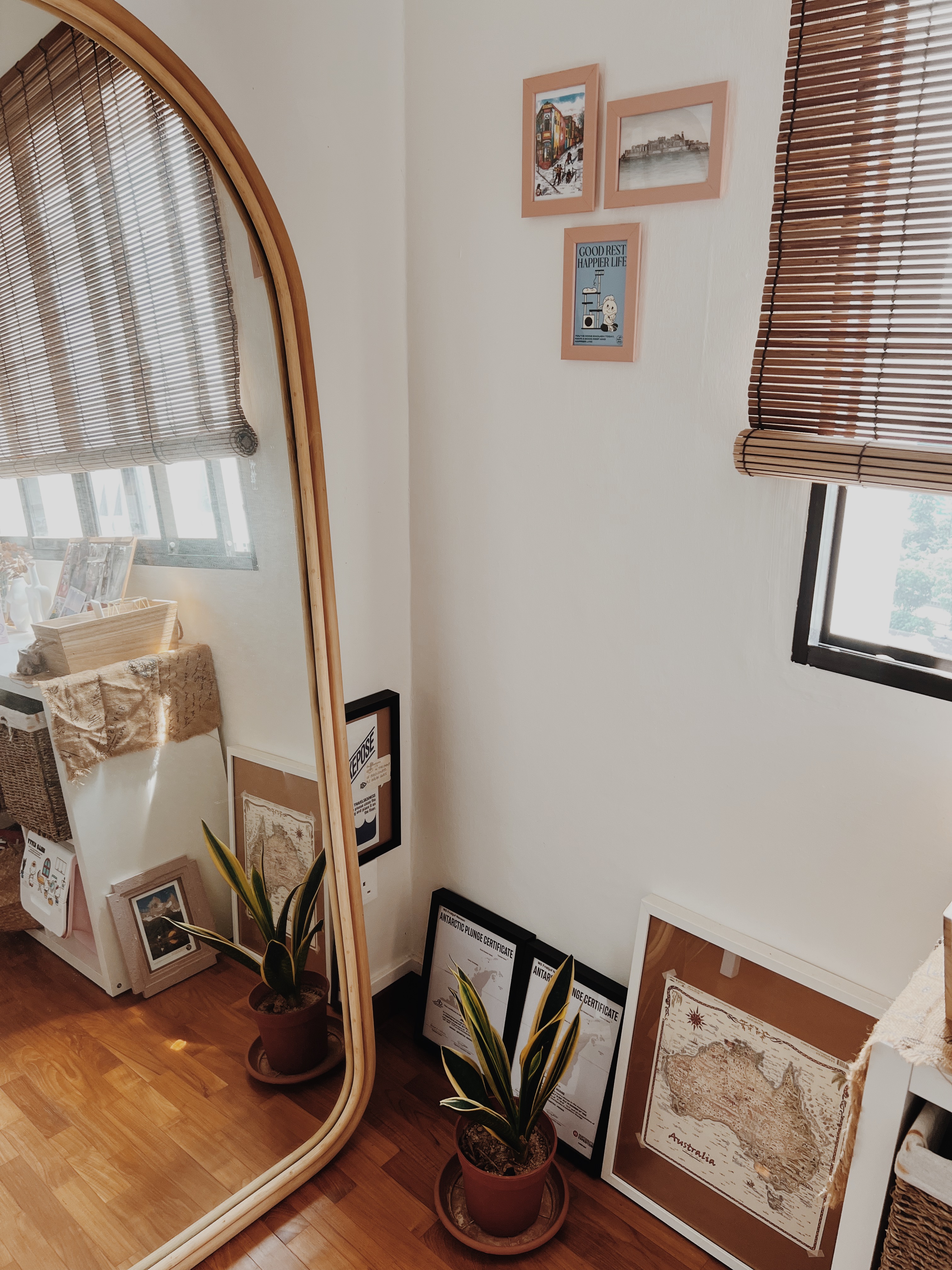 Cozy corners in our Classic Farmhouse that reminds us of our travels - Wooden blinds, framed pictures, potted plants, map of
