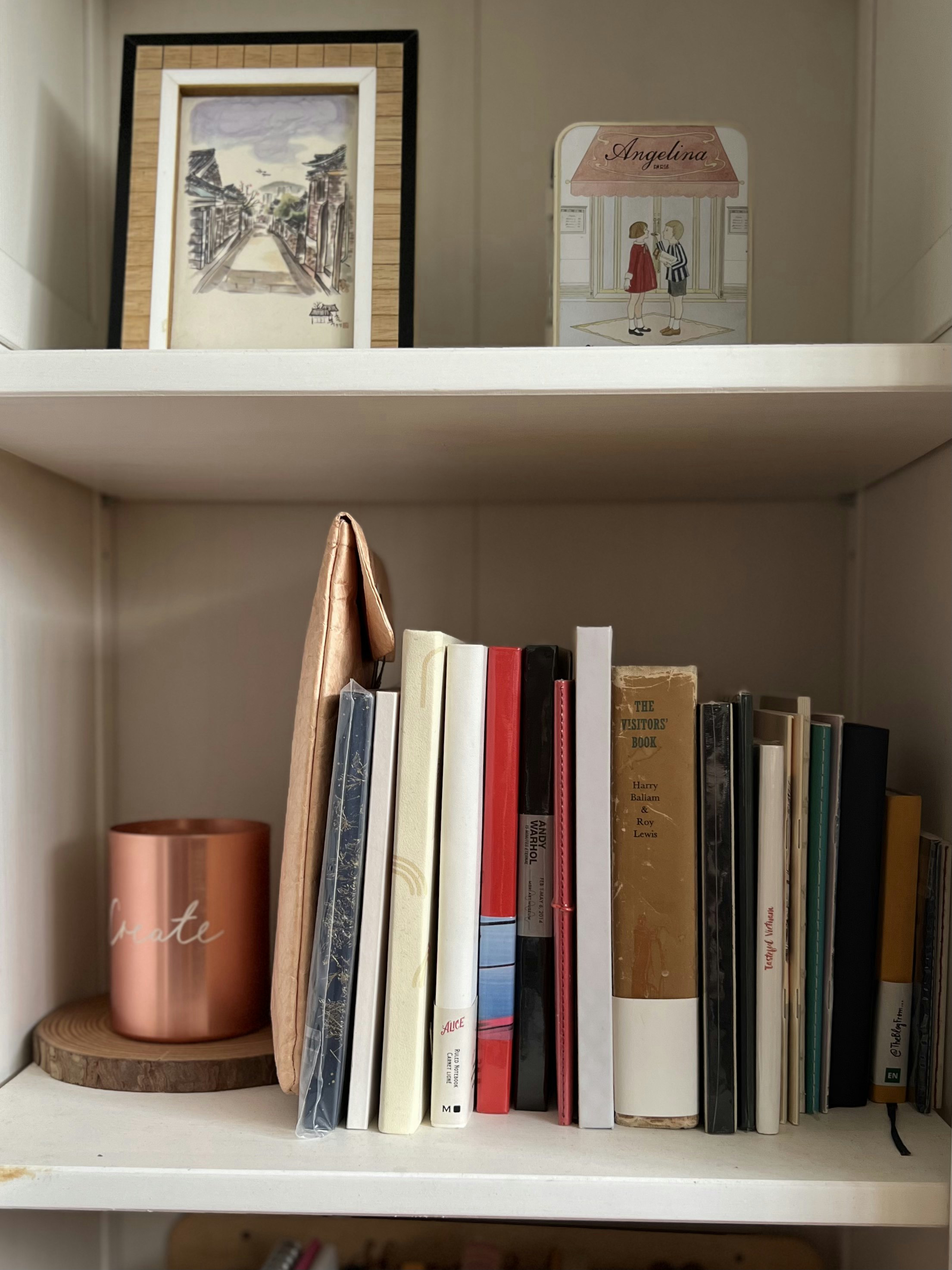 Cozy corners in our Classic Farmhouse that reminds us of our travels - Copper mug, framed picture, bookshelf, books, vintage