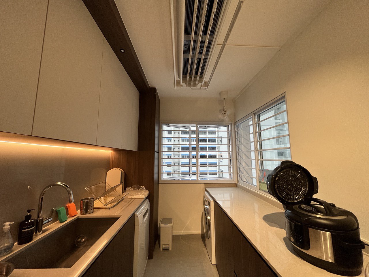 Coziness with a splash of wood and clean lines | Mid-Century Reno <70K - modern kitchen, compact space, dual sink