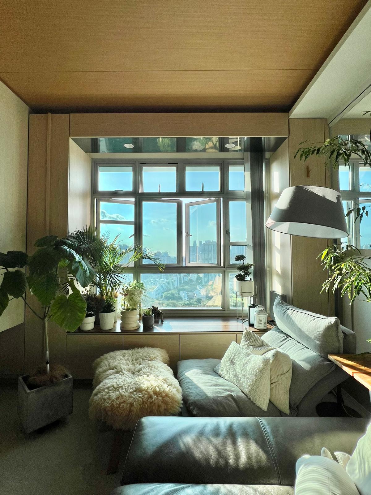 "Embracing the Magic: Day and Night Views from Our Nest ✨🌙" - sunlight streaming through large windows, cityscape view