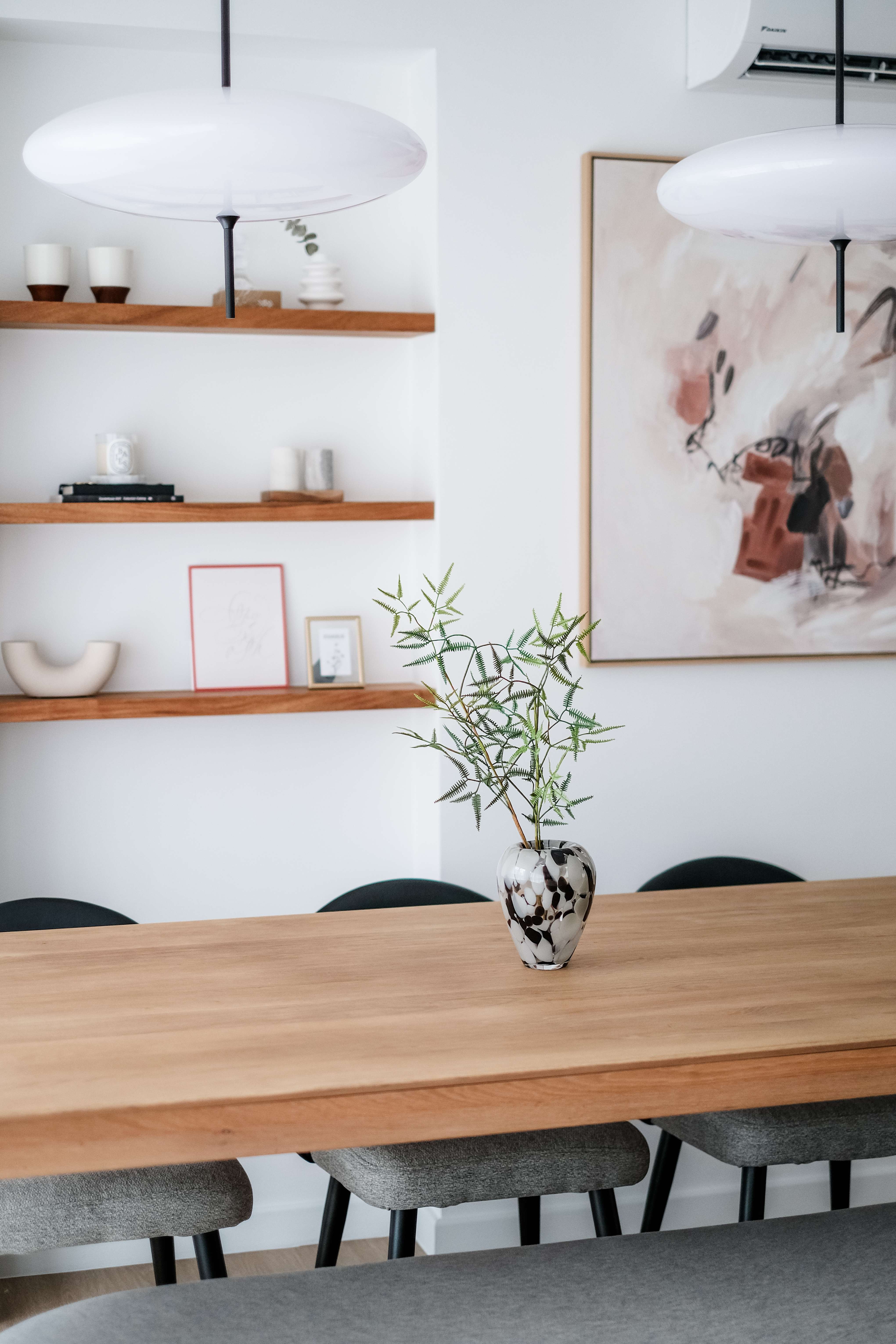 Modern Home With A Large Kitchen Island Around A Pillar. - Modern minimalist dining room, wooden dining table, gray