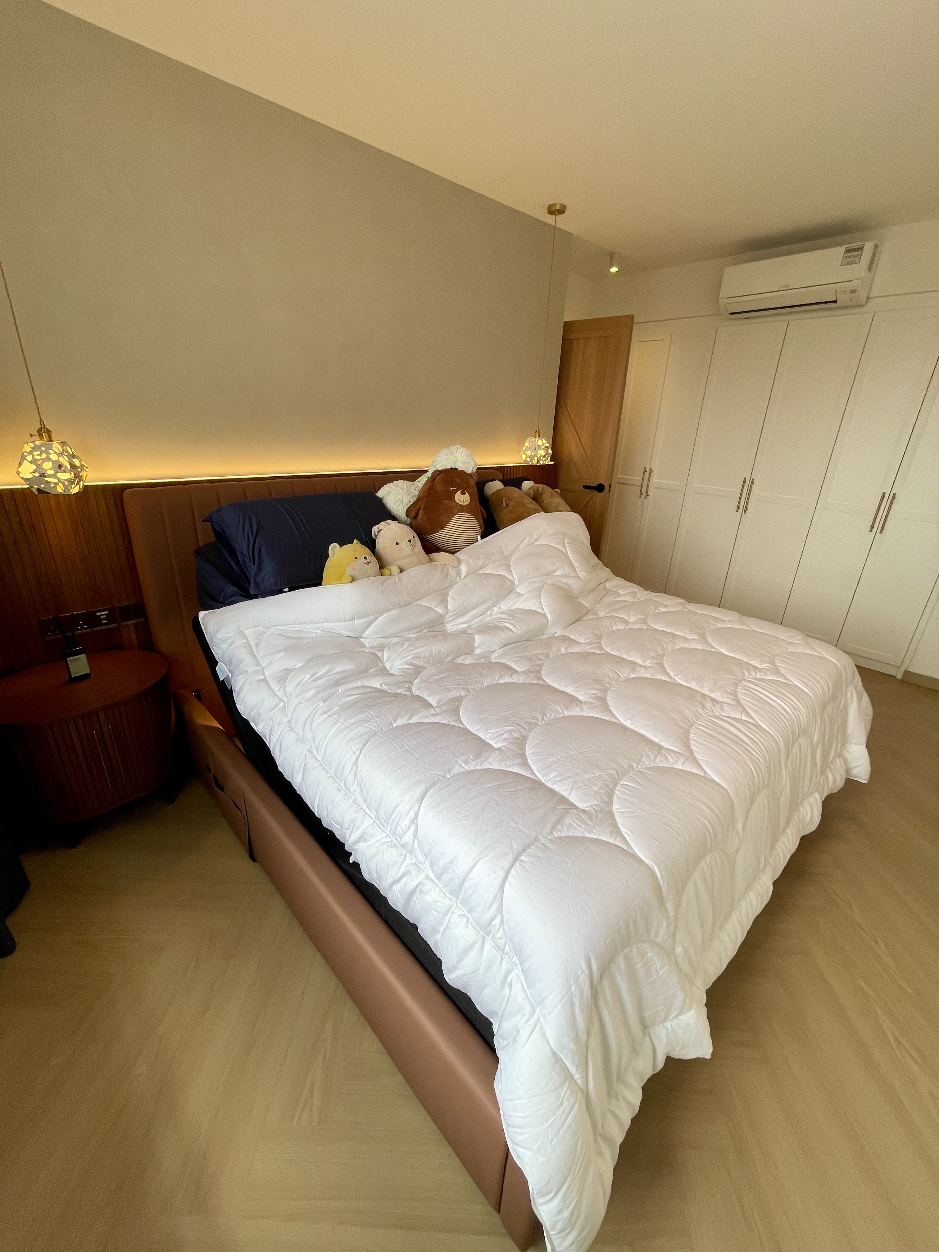 A Self-designed Cosy Abode at Woodleigh Hillside - Modern bedroom with plush teddy bears, white and brown bedding, wooden
