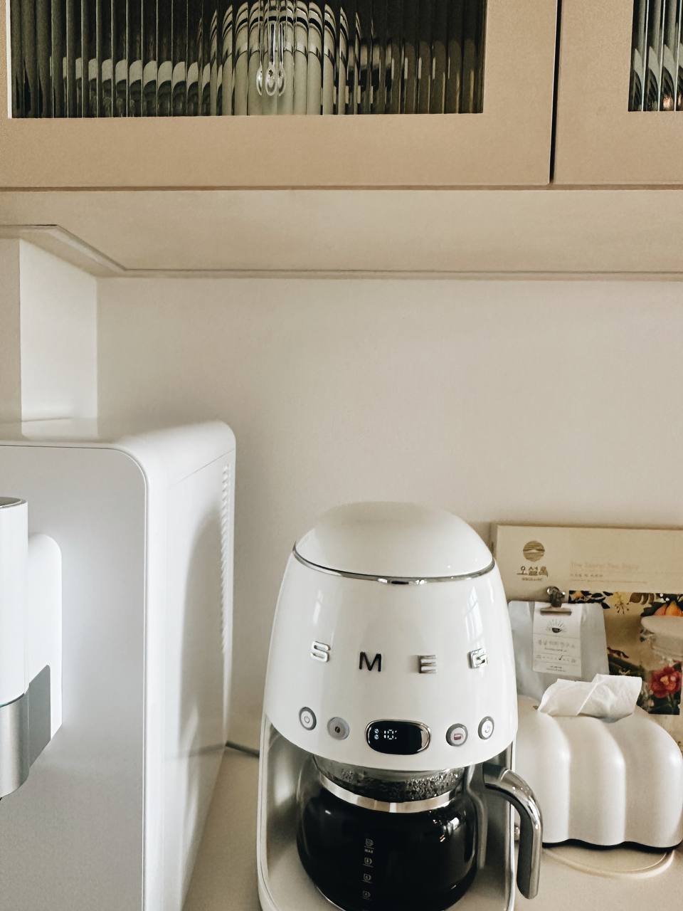 Our 93sqm modern minimalist home  - White SMEG coffee machine, sleek design, modern kitchen counter, minimalist decor