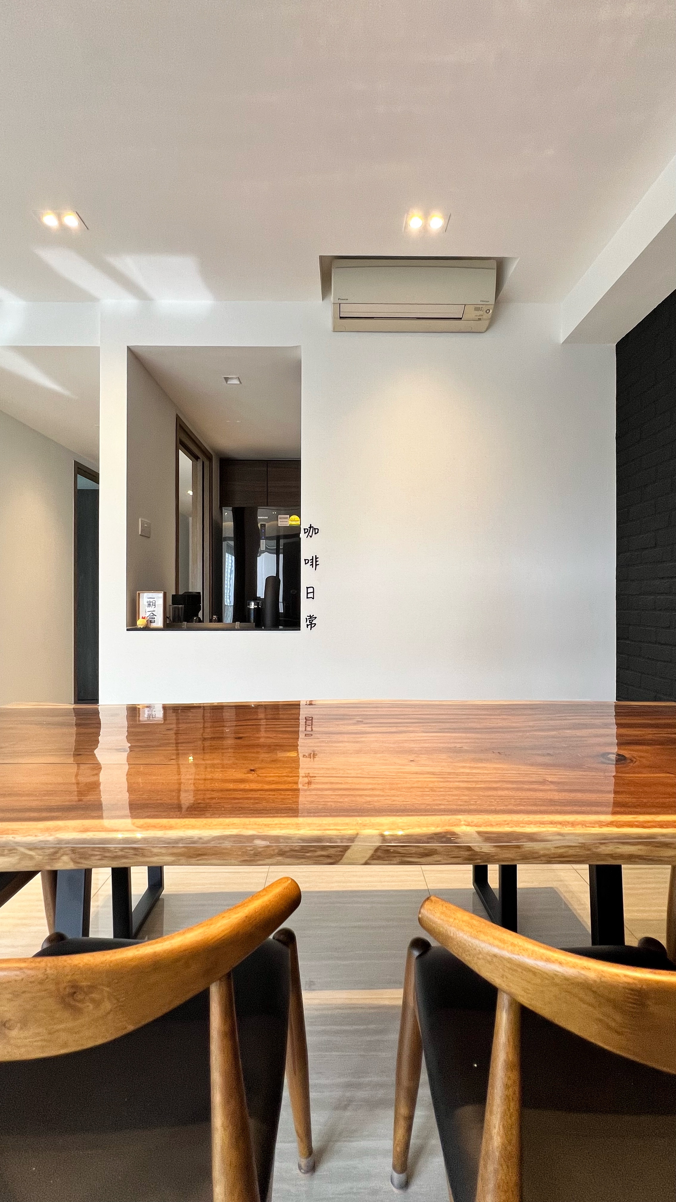 Our little cosmopolitan treehouse! - Wooden dining table, modern interior, minimalist design, sleek chairs, reflective