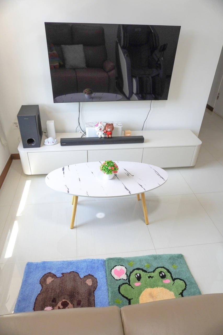 A Japandi Home with a Blue Heart under $30k - Modern living room, minimalist decor, sleek TV stand, white and black color