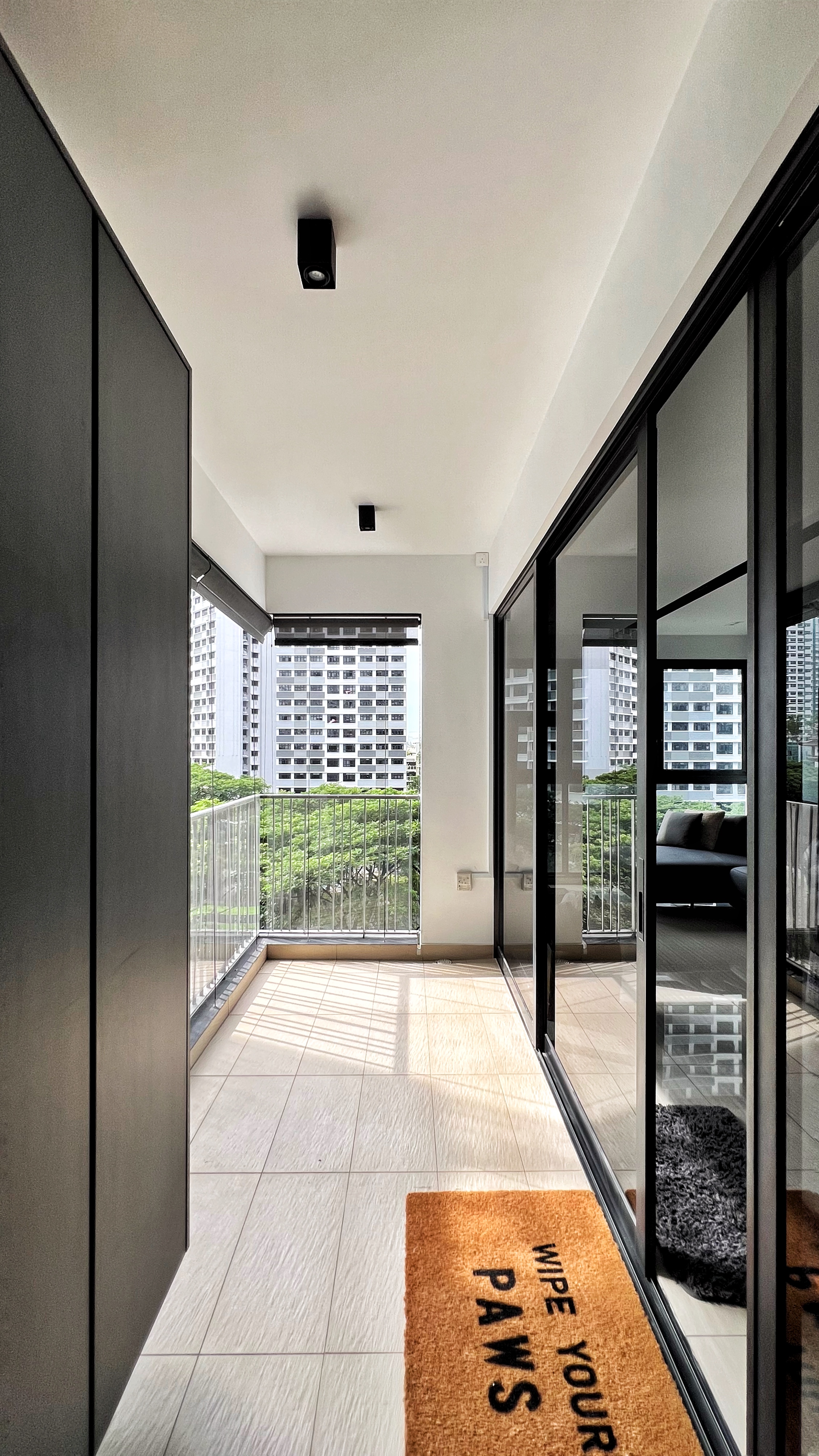 Our little cosmopolitan treehouse! - Modern minimalist interior, spacious balcony, large windows, urban cityscape view