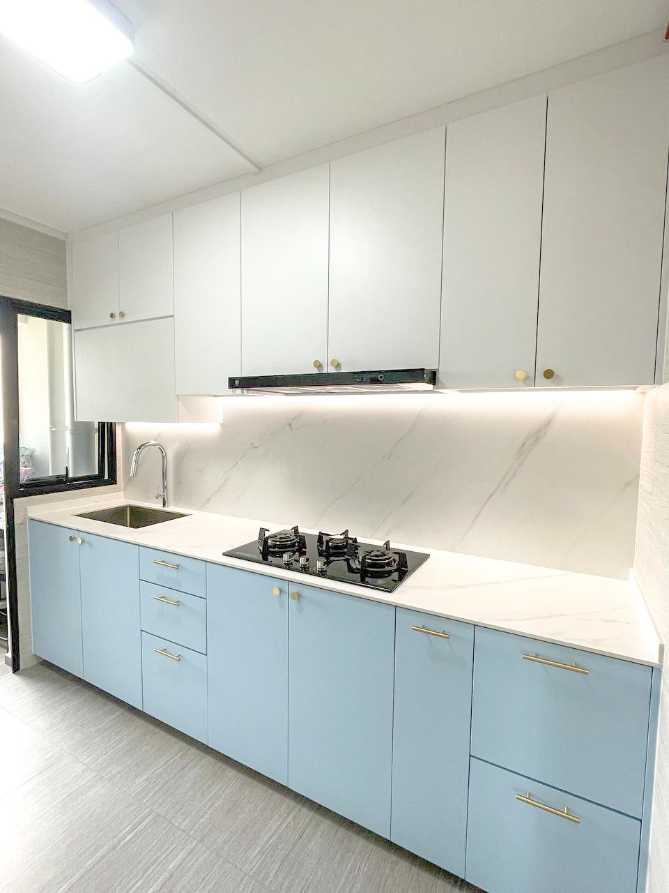 A Japandi Home with a Blue Heart under $30k - Light-colored cabinetry, sleek design, modern kitchen, white countertops, black