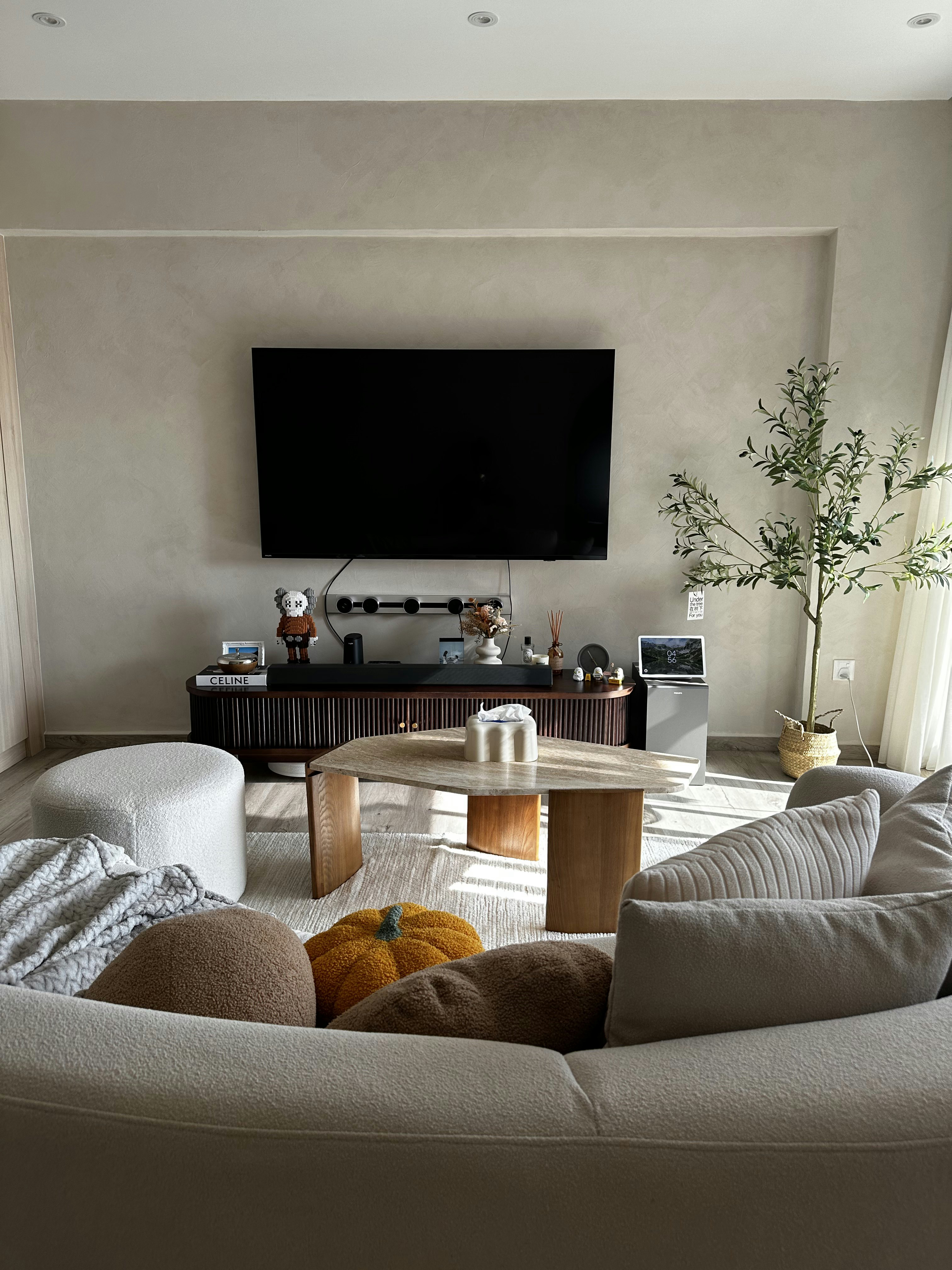 Inside our 1076sqft scandinavian neutral home - Modern living room, minimalist decor, cozy seating, beige walls, large