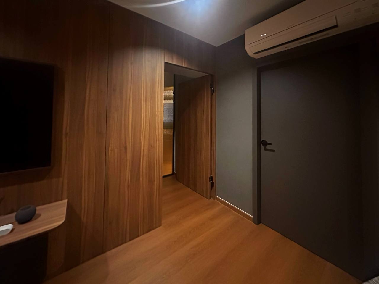 $120K Renovation for a Cozy & Warm Home - Wooden walls, modern design, minimalist decor, open doorway, wooden flooring, sleek