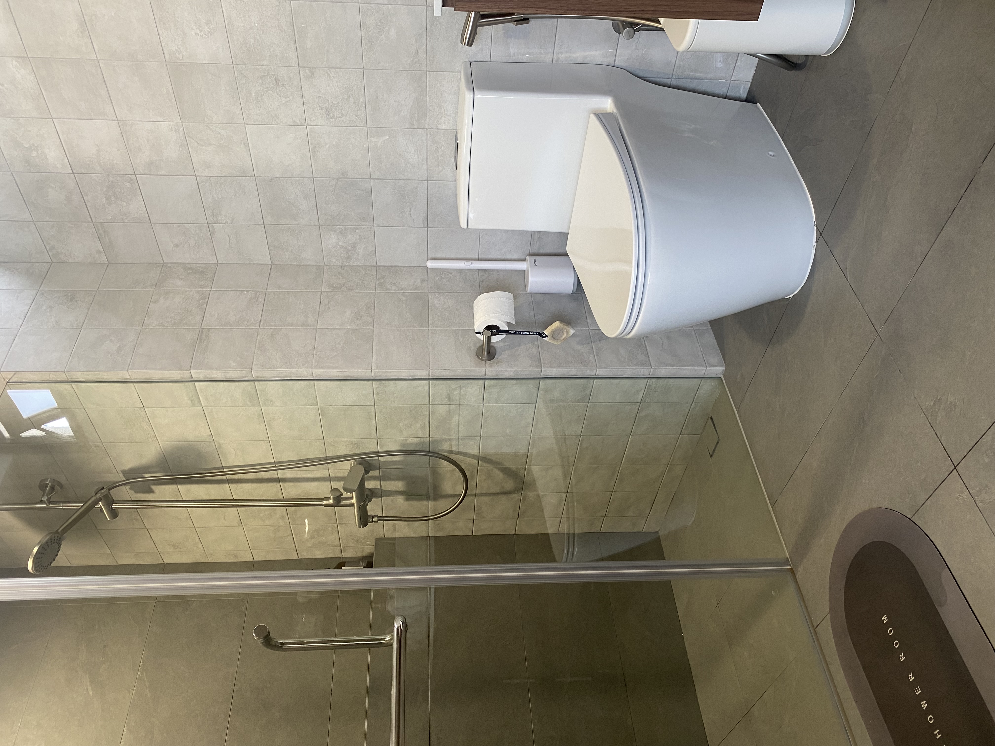 A-home-gallery-and-library-in-dark-wood-and-grey-tones