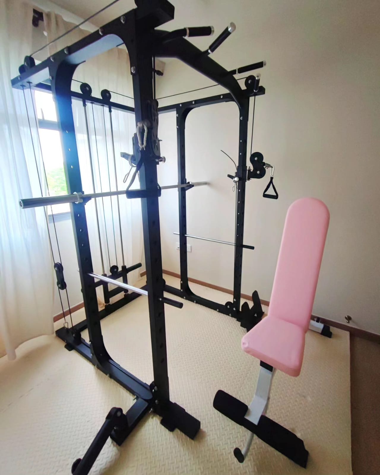 Welcome to our 15K modest & minimal home with 2 cats - black exercise machine, home gym, fitness equipment, black metal