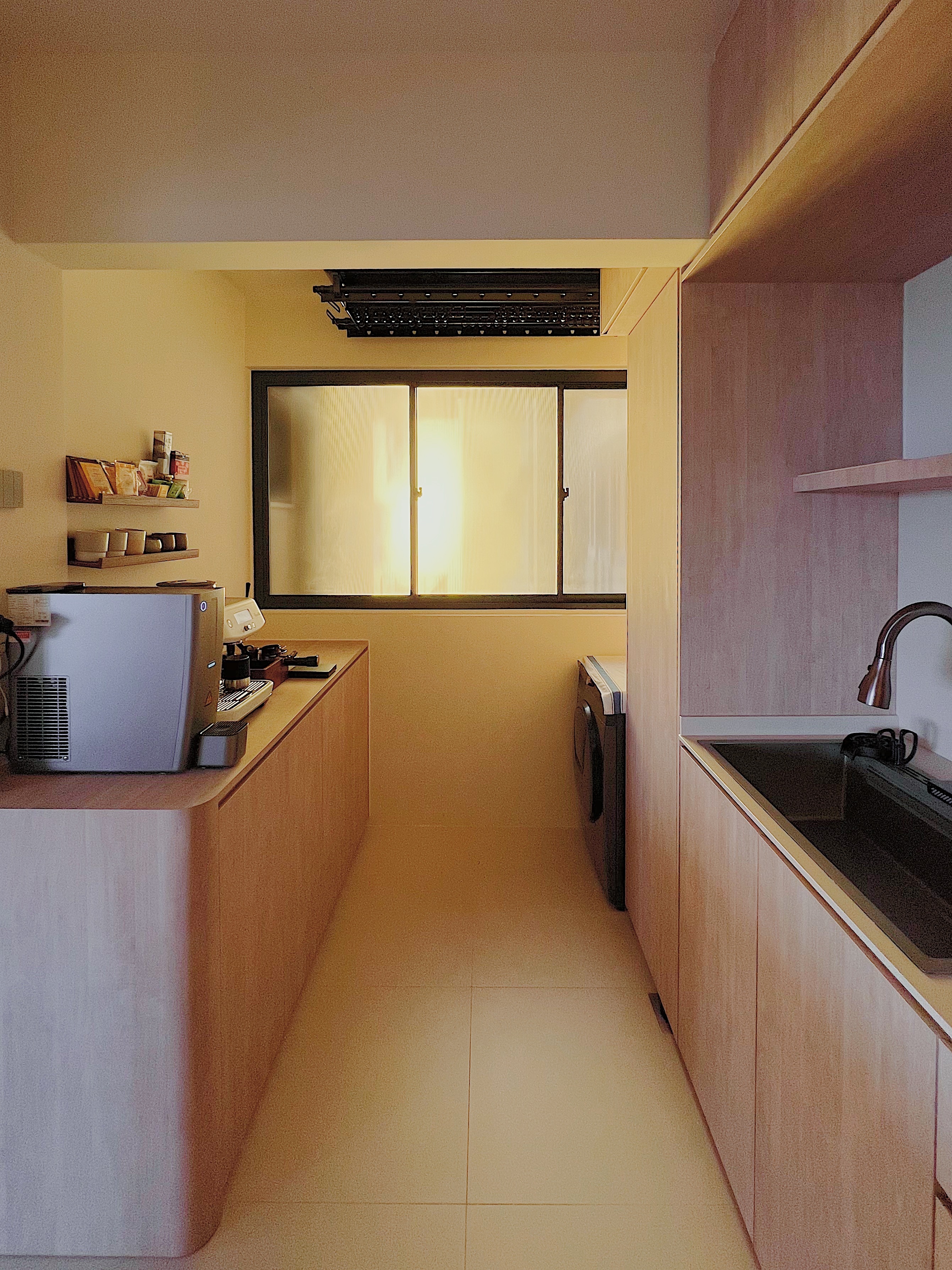 Neutral Palette Japandi Haven in Tampines  - Wooden kitchen cabinetry, modern appliances, beige walls, frosted glass window