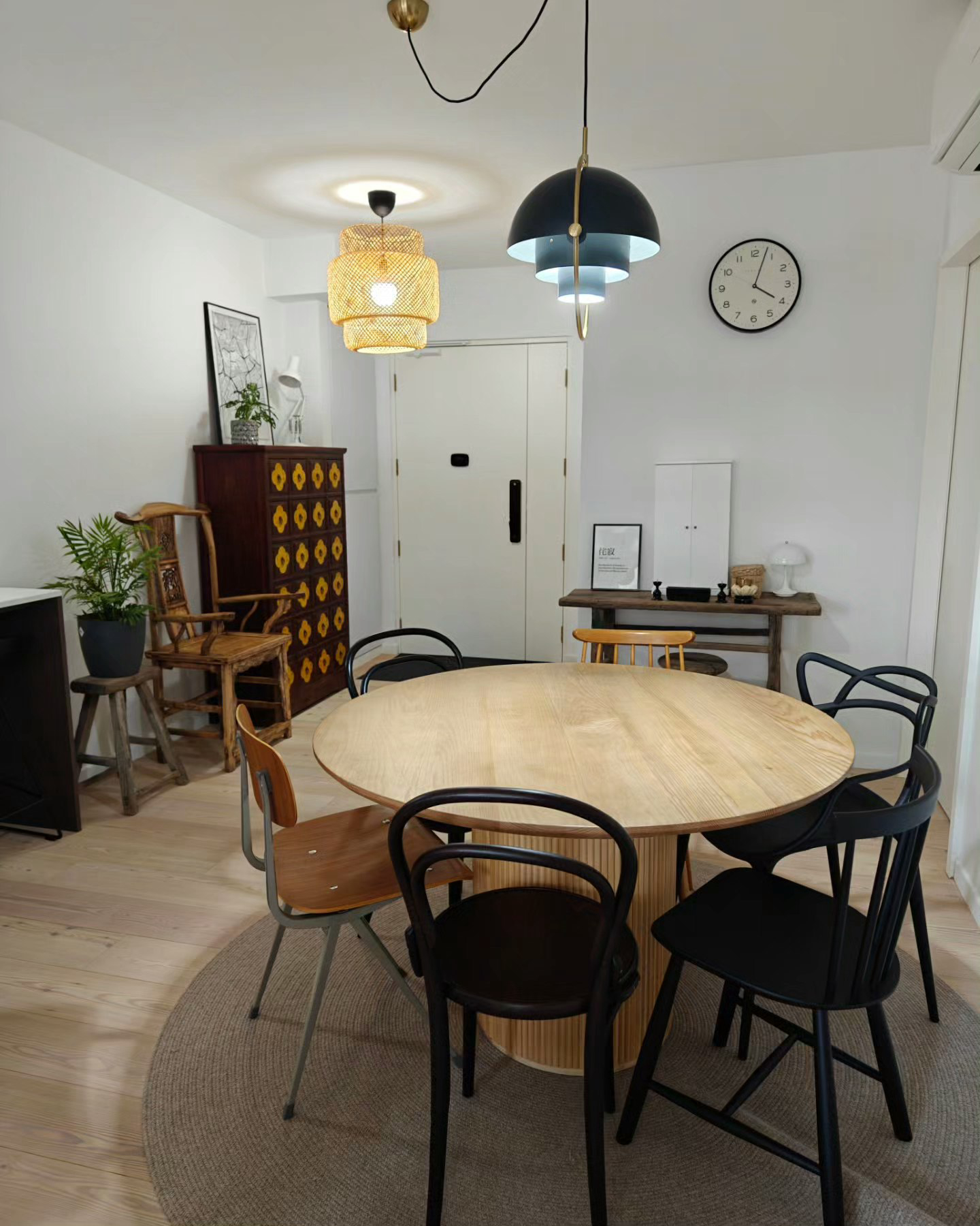 A (3D)Picture Speaks A Thousand Words - modern dining room, round wooden table, black chairs, minimalist decor, white walls