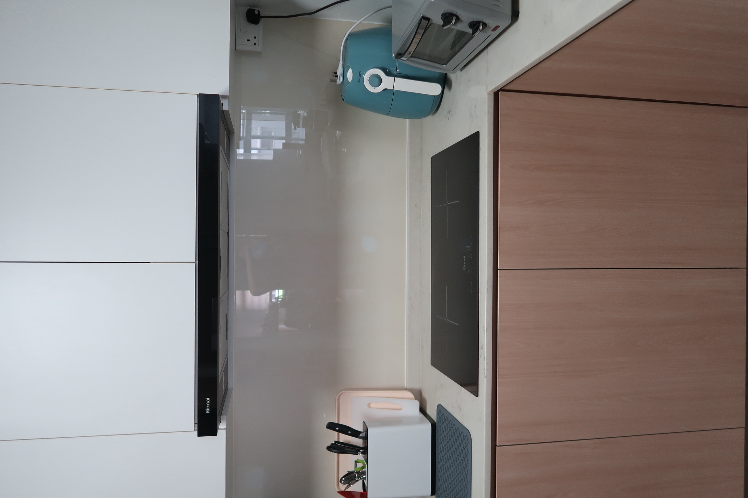 Simple Scandinavian home under $30k renovation in the East - Kitchen countertop, modern appliances, blue electric kettle