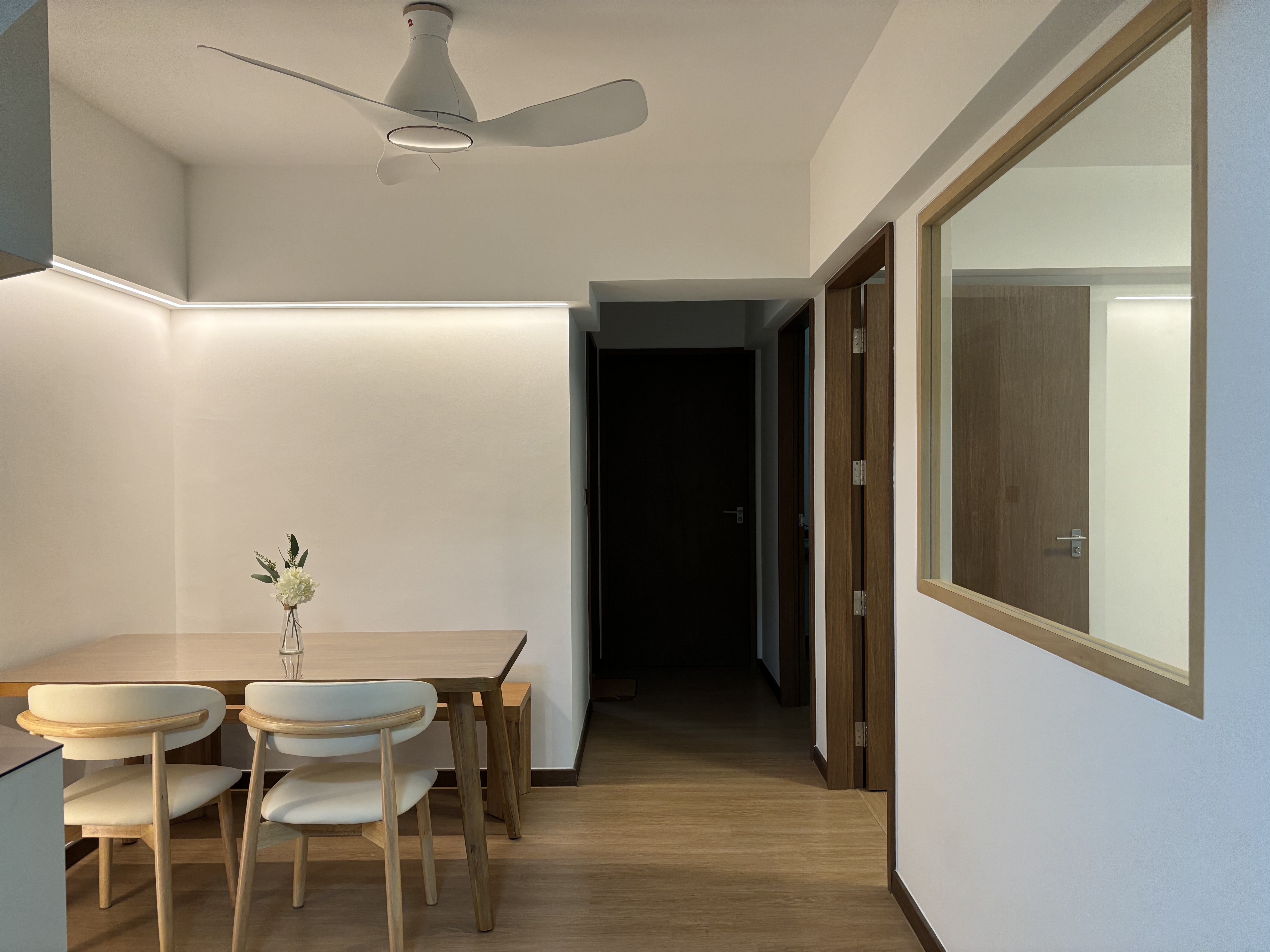 Bright, Airy & Relaxing 4-room Coastal Farmhouse at $40k - Modern minimalist dining room, sleek ceiling fan, wooden dining