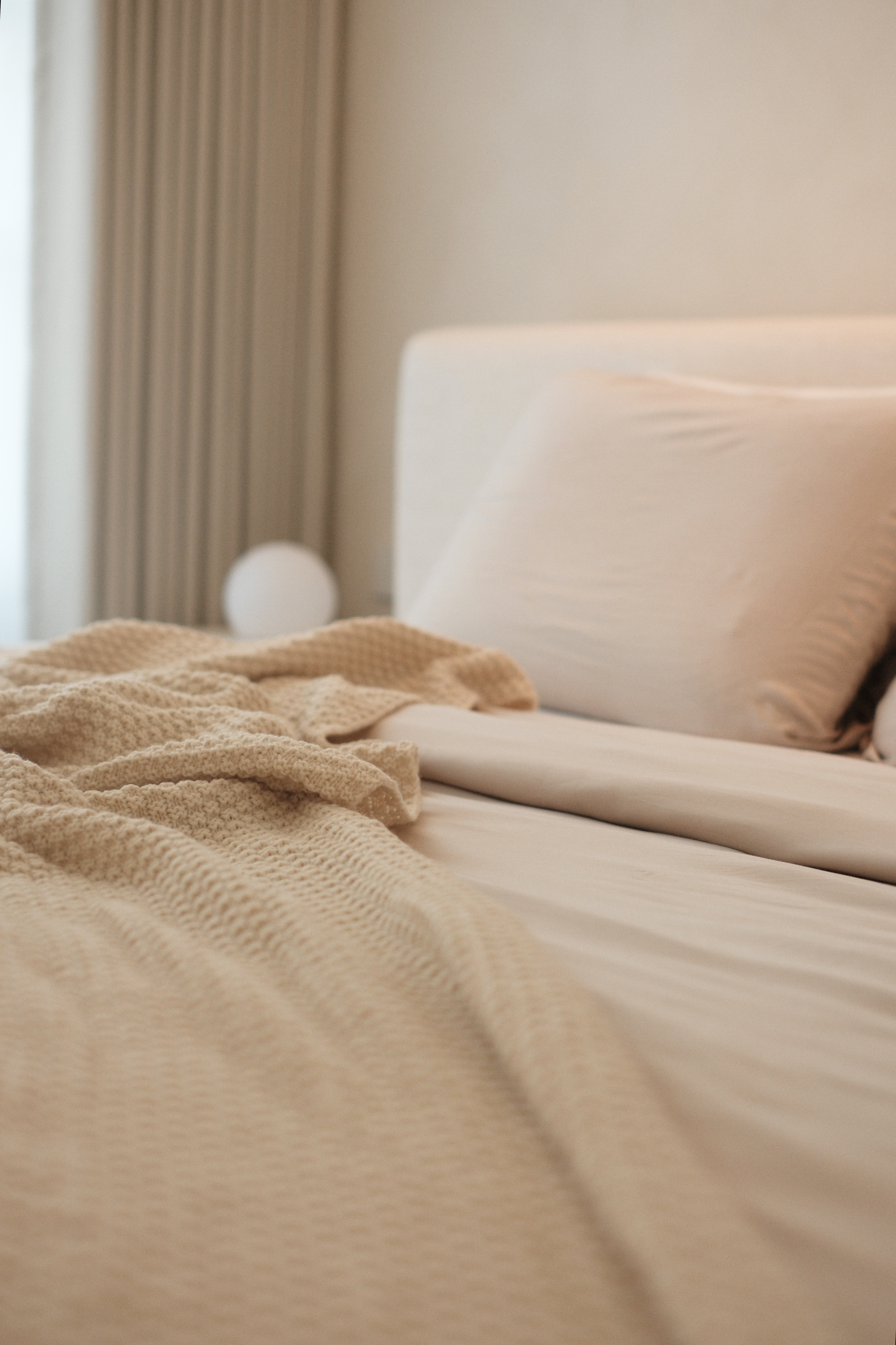 Wake Me Up In 5 Minutes: Our Cream Minimalist Bedroom - Cream-colored, cozy, soft, textured blanket, neatly arranged pillows