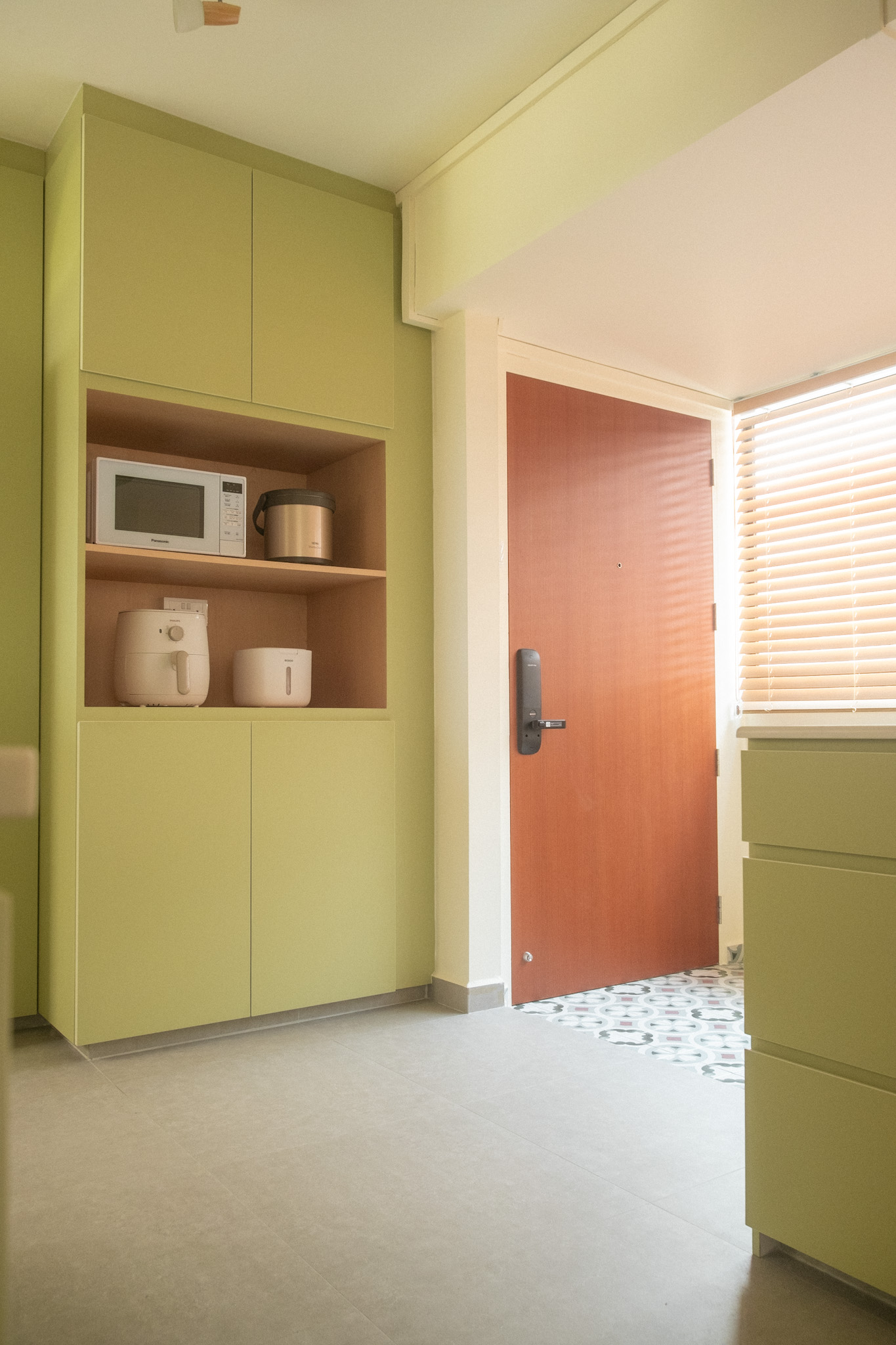 Maximising space in our cosy & quirky home with cats - Green kitchen cabinets, microwave, rice cooker, toaster oven, window