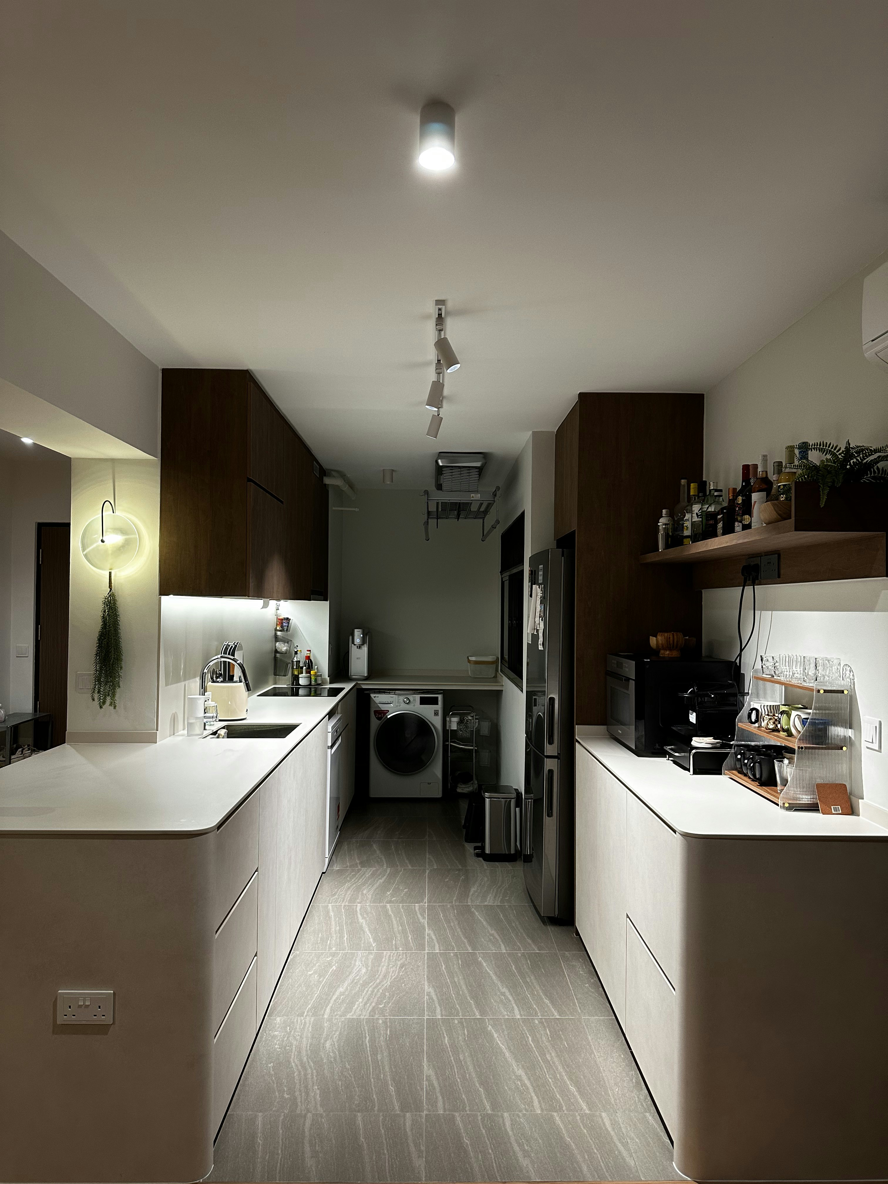 Bauhaus cathaus - $38k 4BR Reno for an open, flexible space       - Modern kitchen with sleek design, white countertops