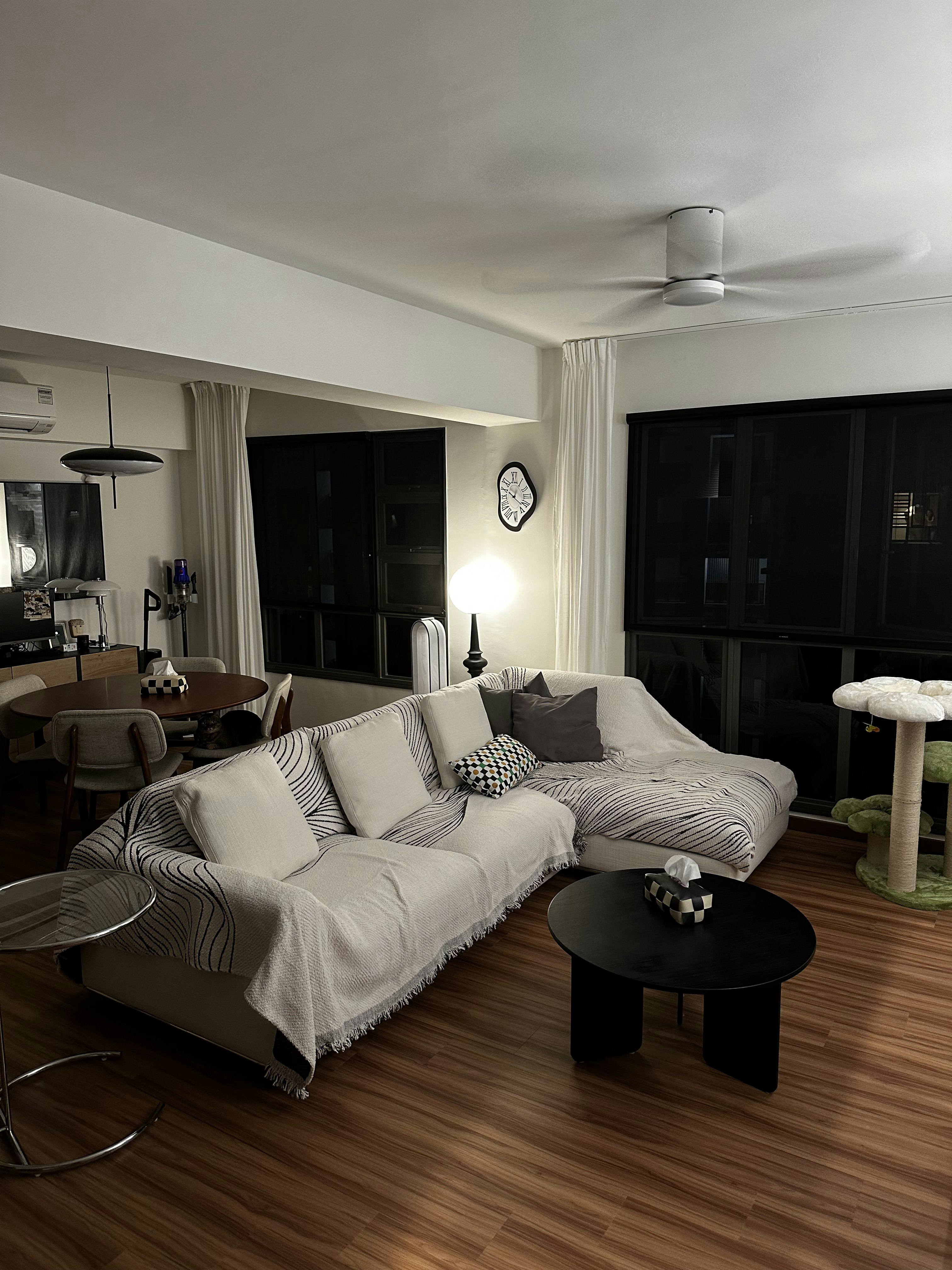 Bauhaus cathaus - $38k 4BR Reno for an open, flexible space       - Modern living room, cozy seating, beige sofa, striped