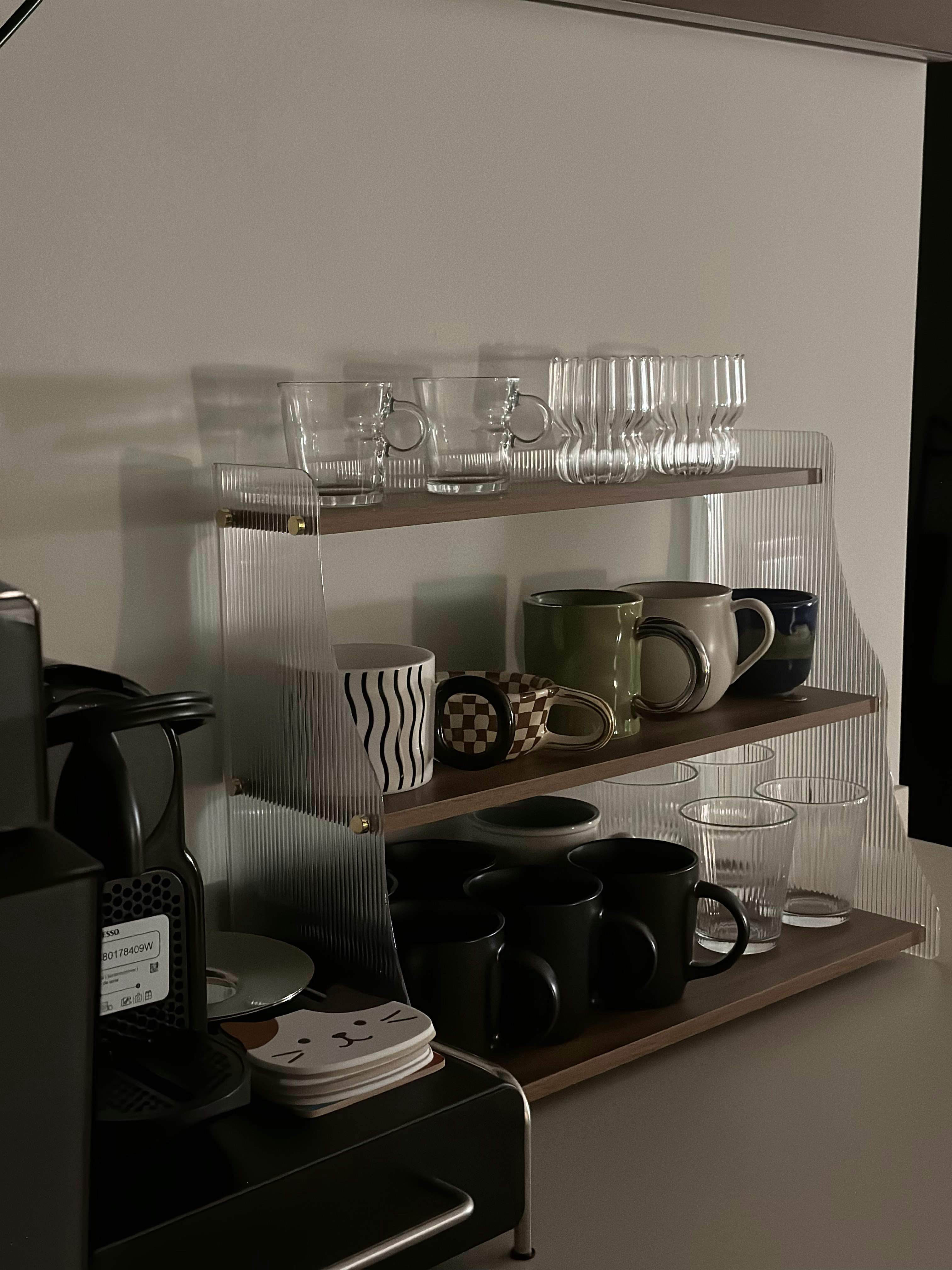 Bauhaus cathaus - $38k 4BR Reno for an open, flexible space       - Clear glass mugs, black and white striped mug, checkered