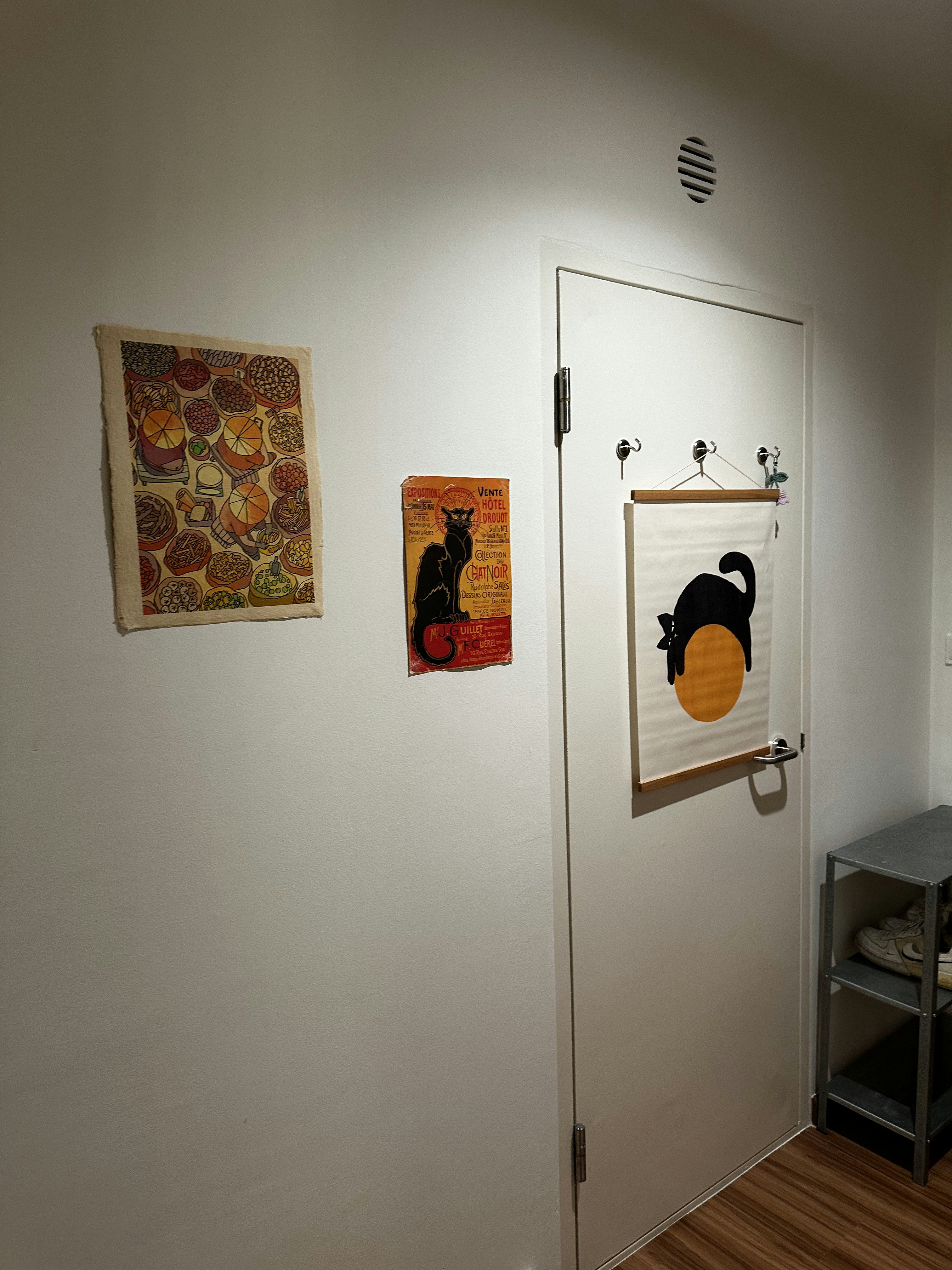 Bauhaus cathaus - $38k 4BR Reno for an open, flexible space       - Artistic posters on white walls, Colorful fruit and