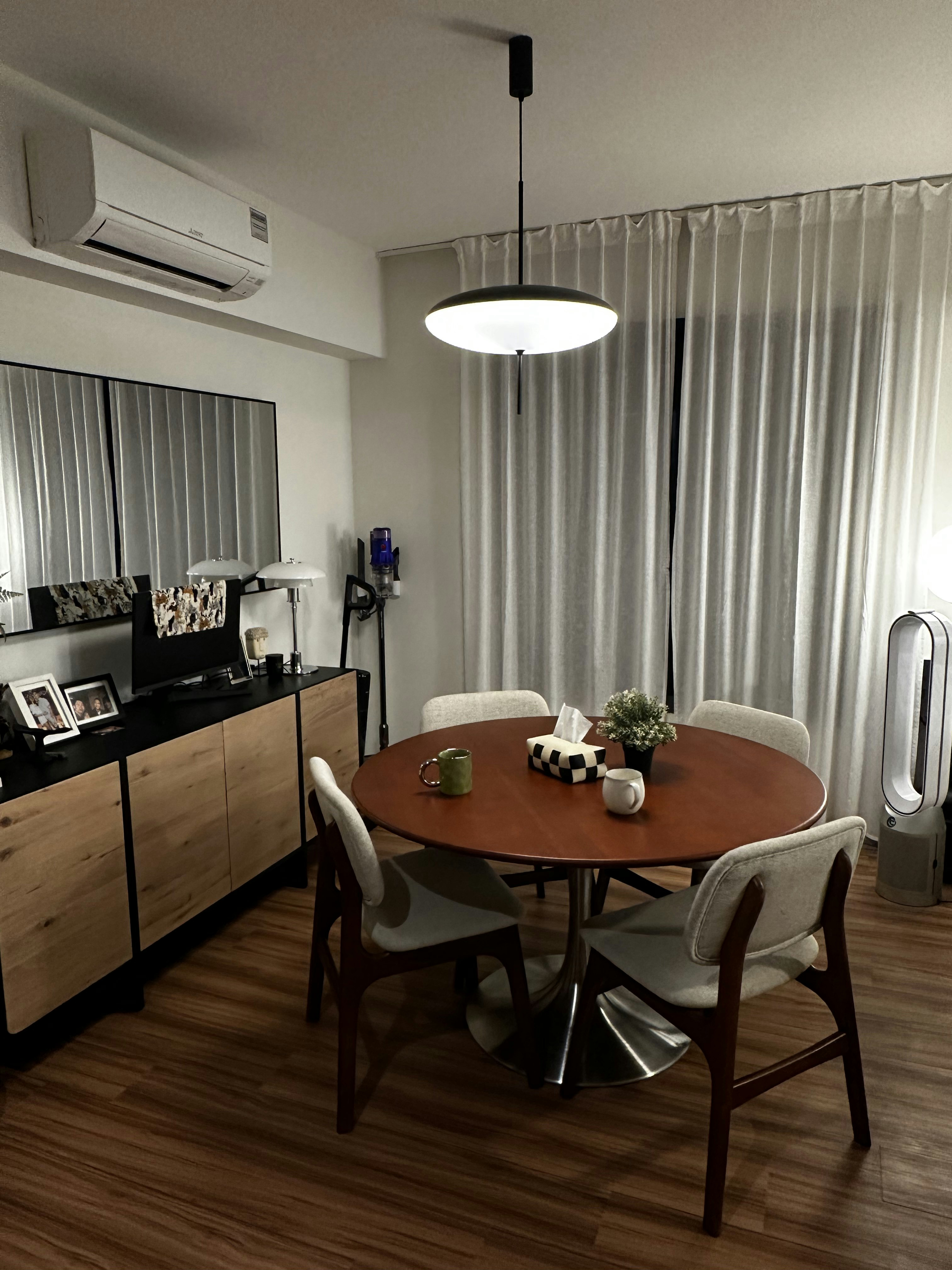 Bauhaus cathaus - $38k 4BR Reno for an open, flexible space       - Modern dining room, minimalist design, round wooden