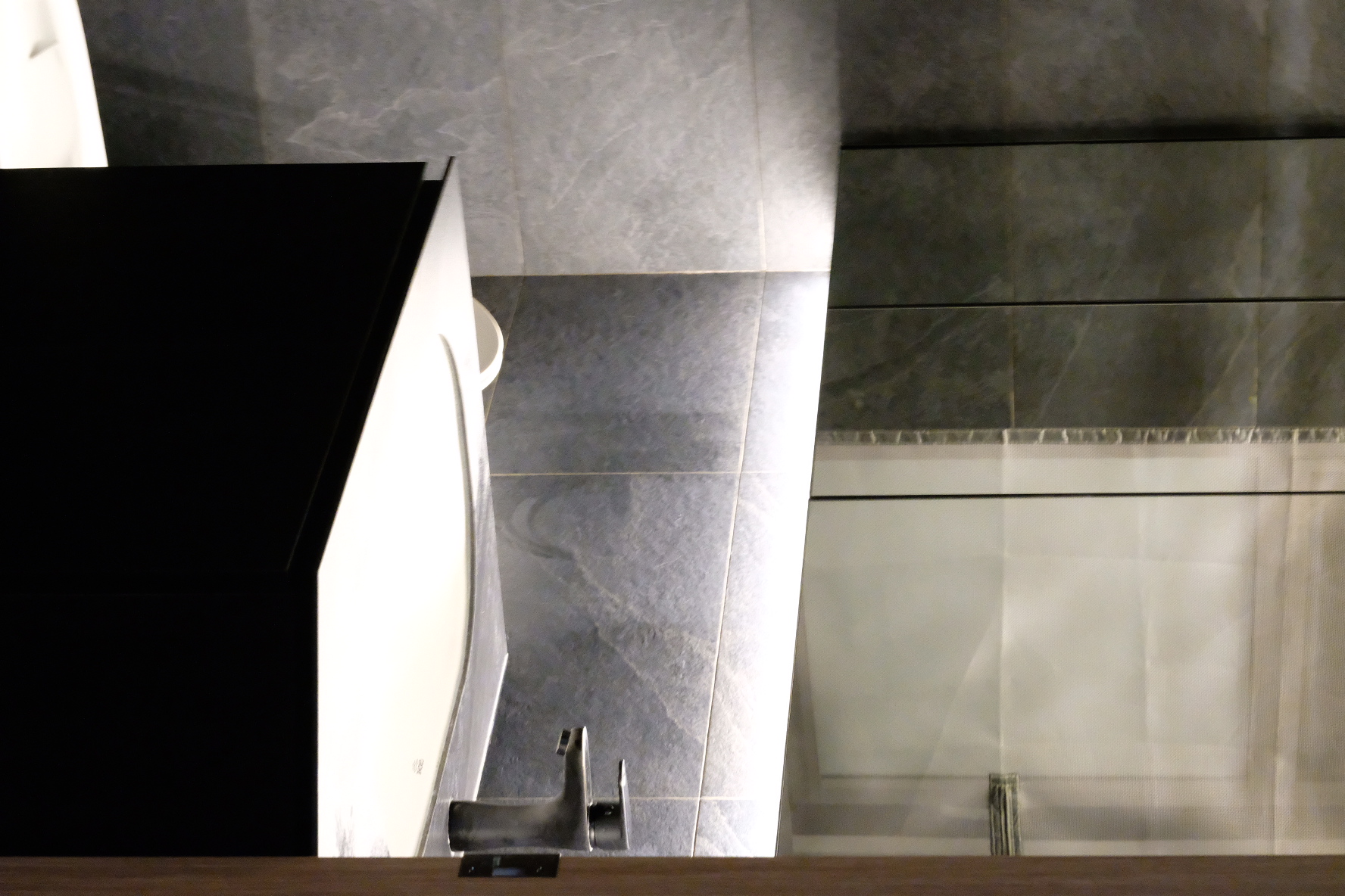 House Tour: Dark Modern Minimalist under 35k Renovation - Grey tiled bathroom floor, modern design, sleek fixtures