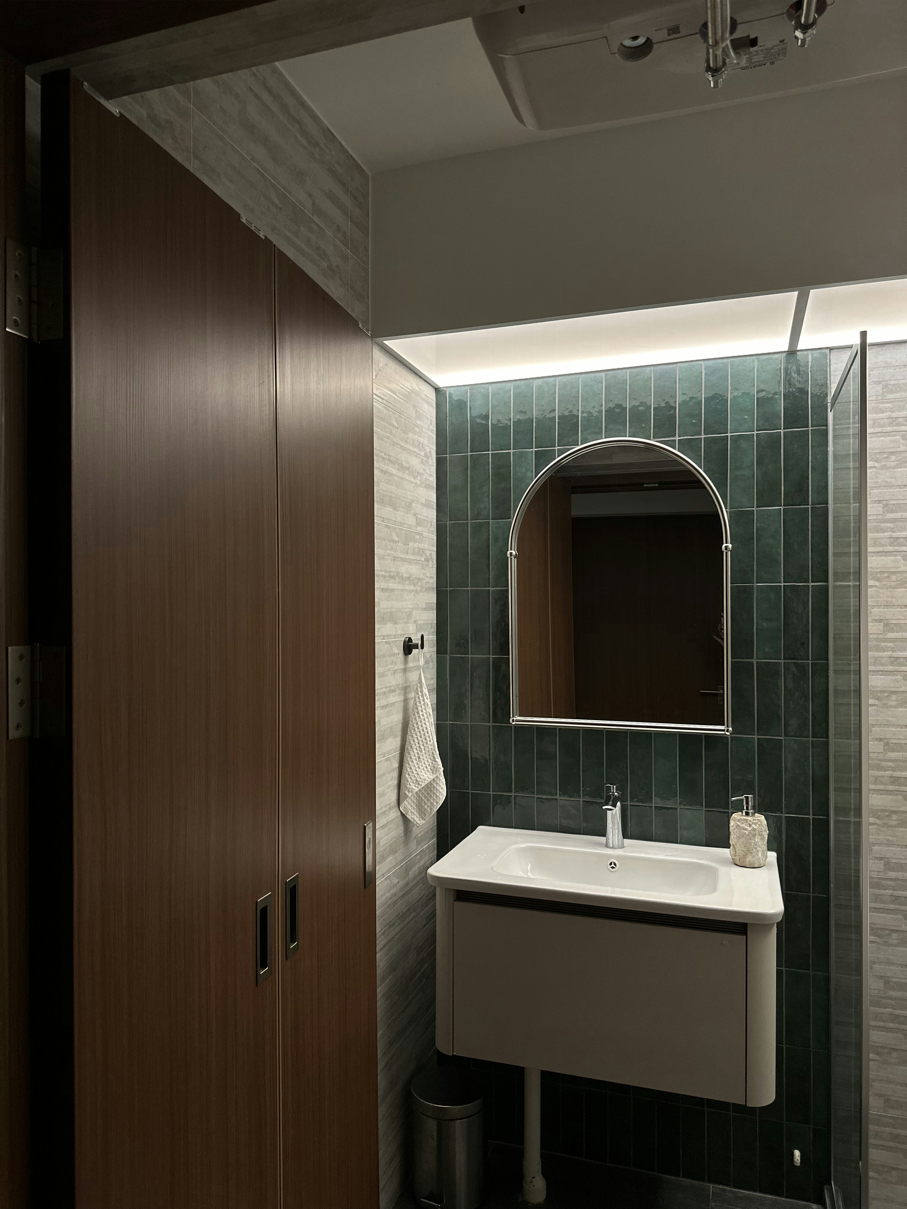 Bauhaus cathaus - $38k 4BR Reno for an open, flexible space       - Wooden wardrobe, green tiled wall, arched mirror, white