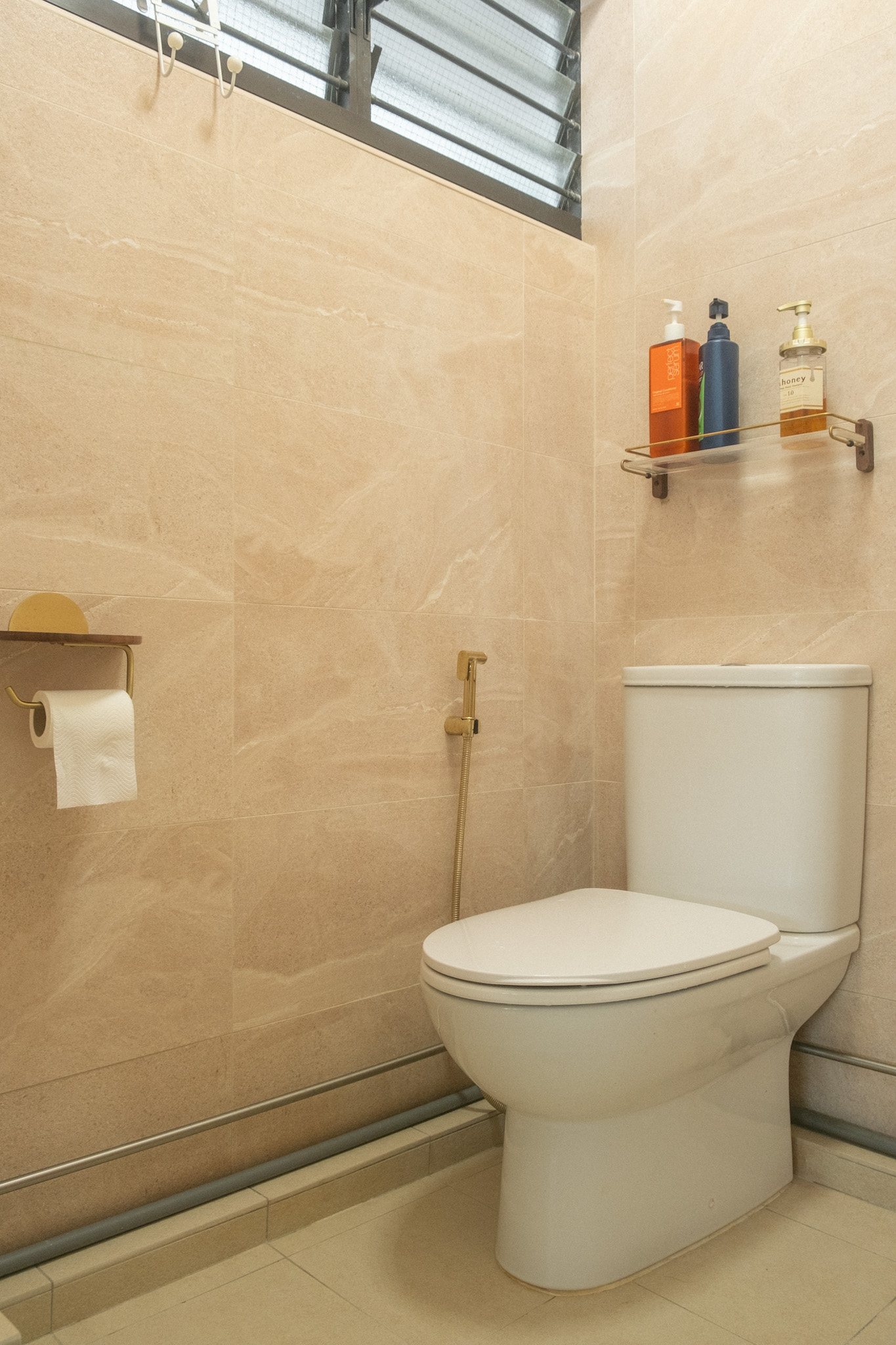 Maximising space in our cosy & quirky home with cats - Cream tiled bathroom, white toilet, beige walls, modern design