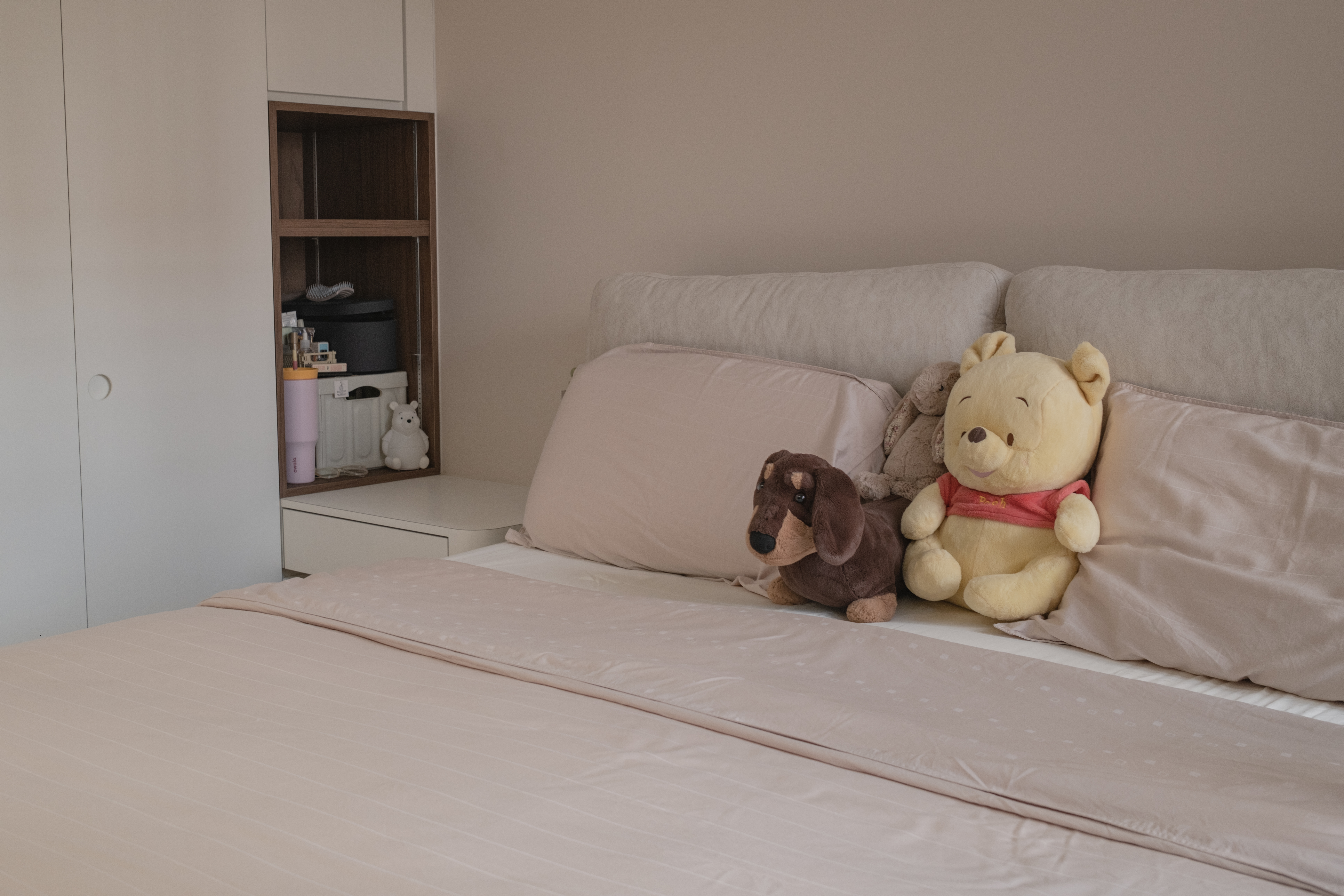 Inside our odd-shaped mid-century eclectic home - Soft, cozy, minimalist, bedroom, bed, plush toys, teddy bear, dog, pillows