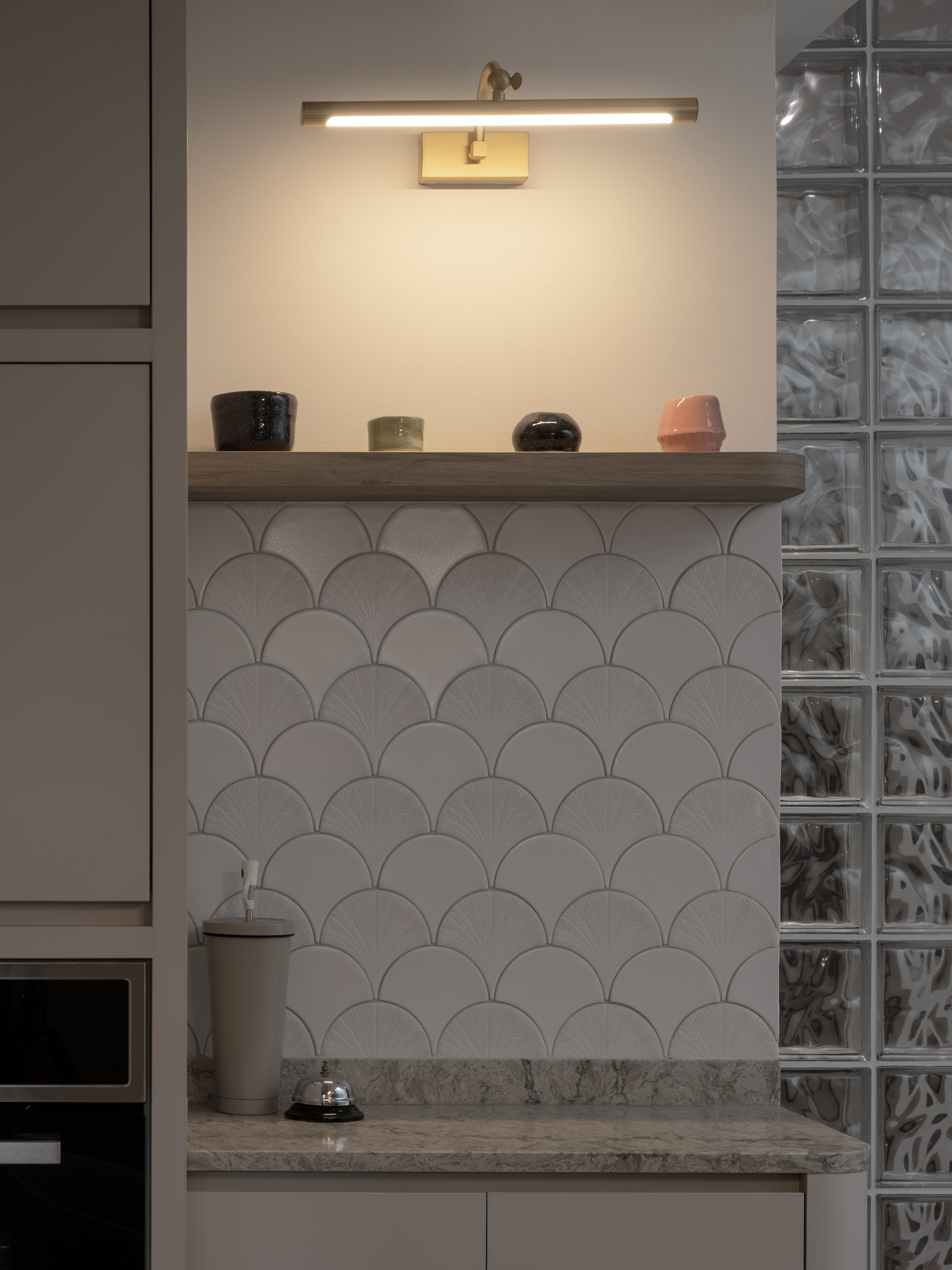 Inside a 300k Reno Modern Gallery-Inspired Maisonette - modern kitchen, minimalist design, elegant backsplash, geometric