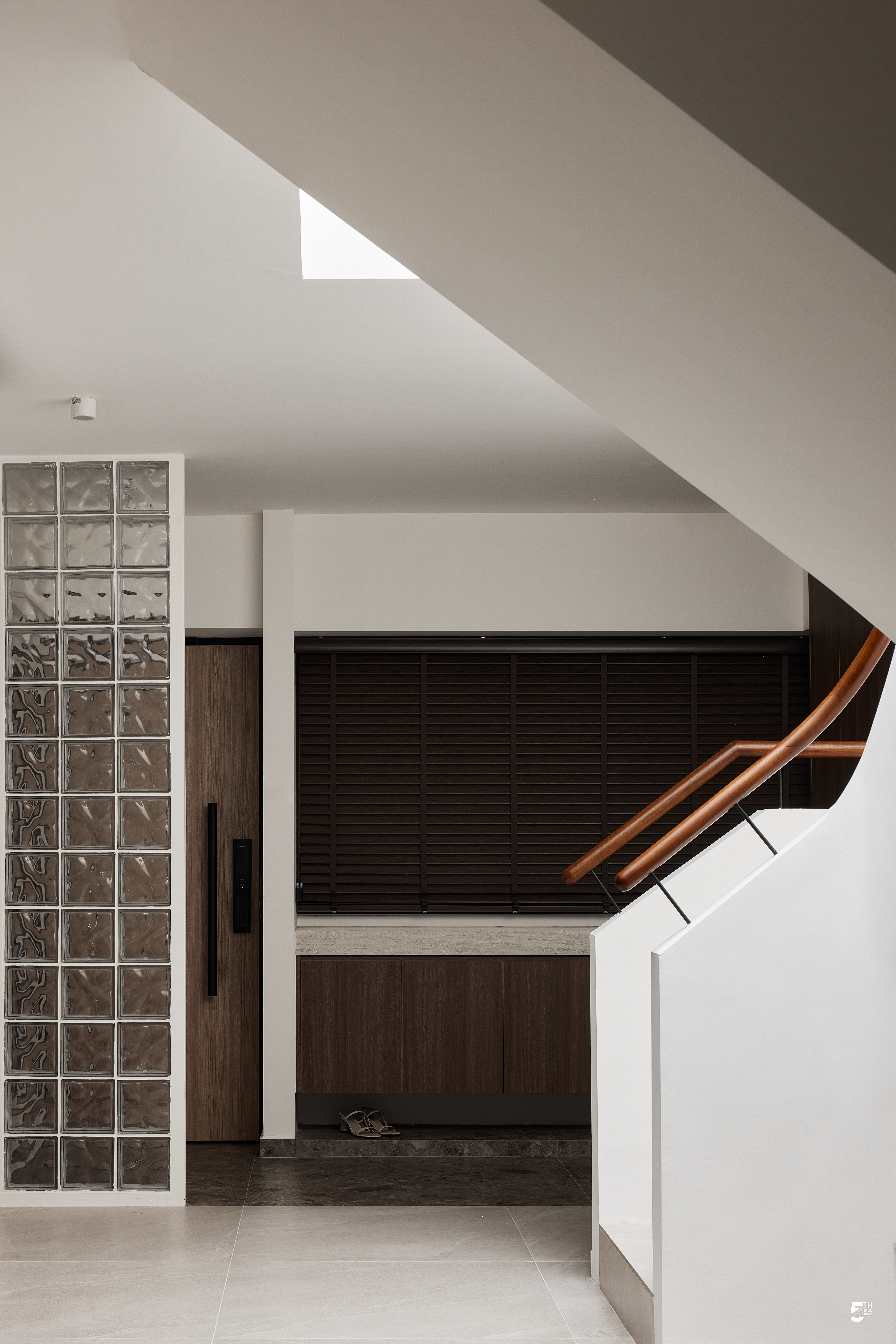 Inside a 300k Reno Modern Gallery-Inspired Maisonette - Modern interior design, minimalist aesthetic, sleek staircase, wooden