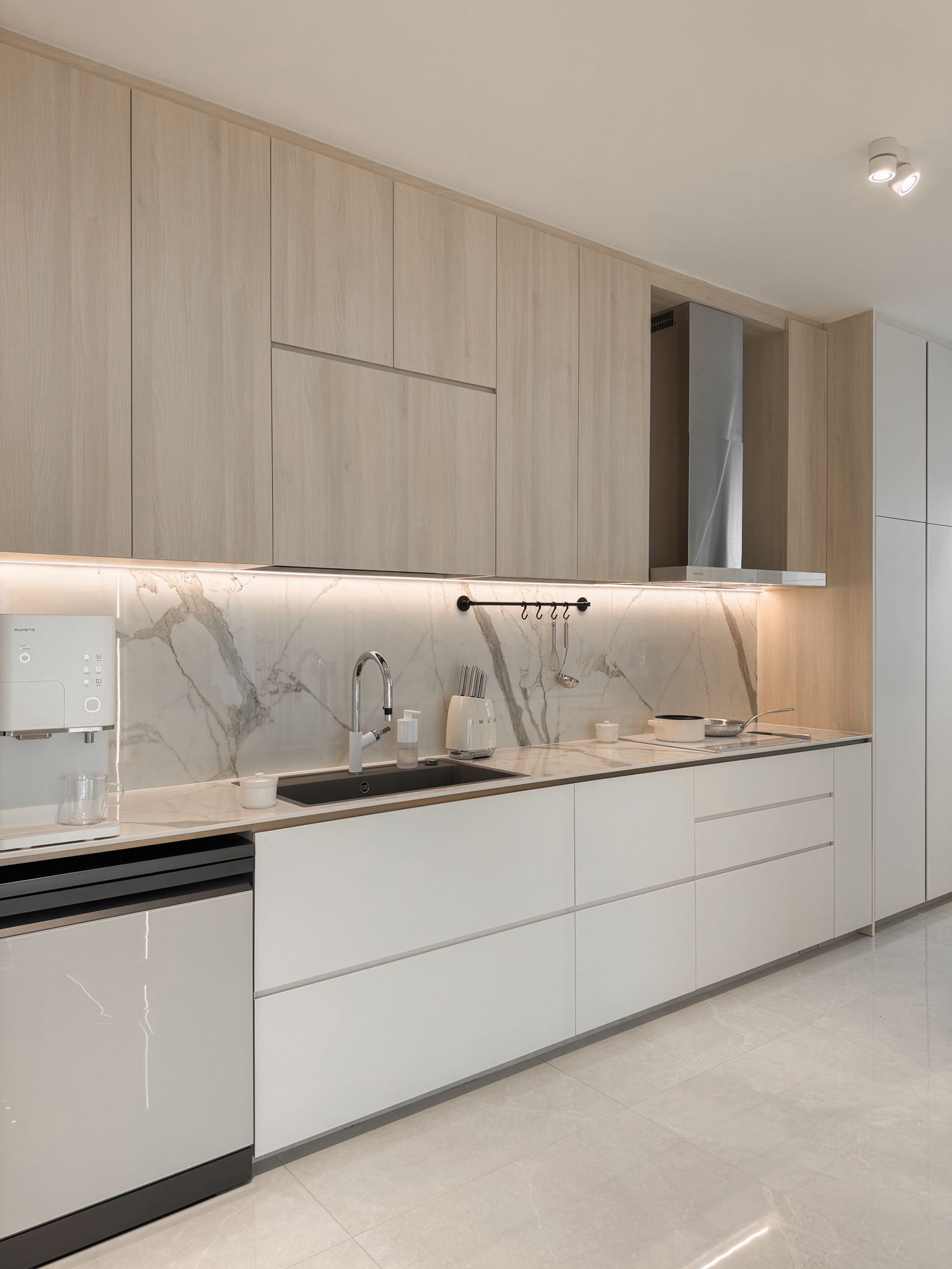 Light & airy, with a touch of luxe - Wooden cabinetry, marble backsplash, sleek design, modern kitchen, white appliances
