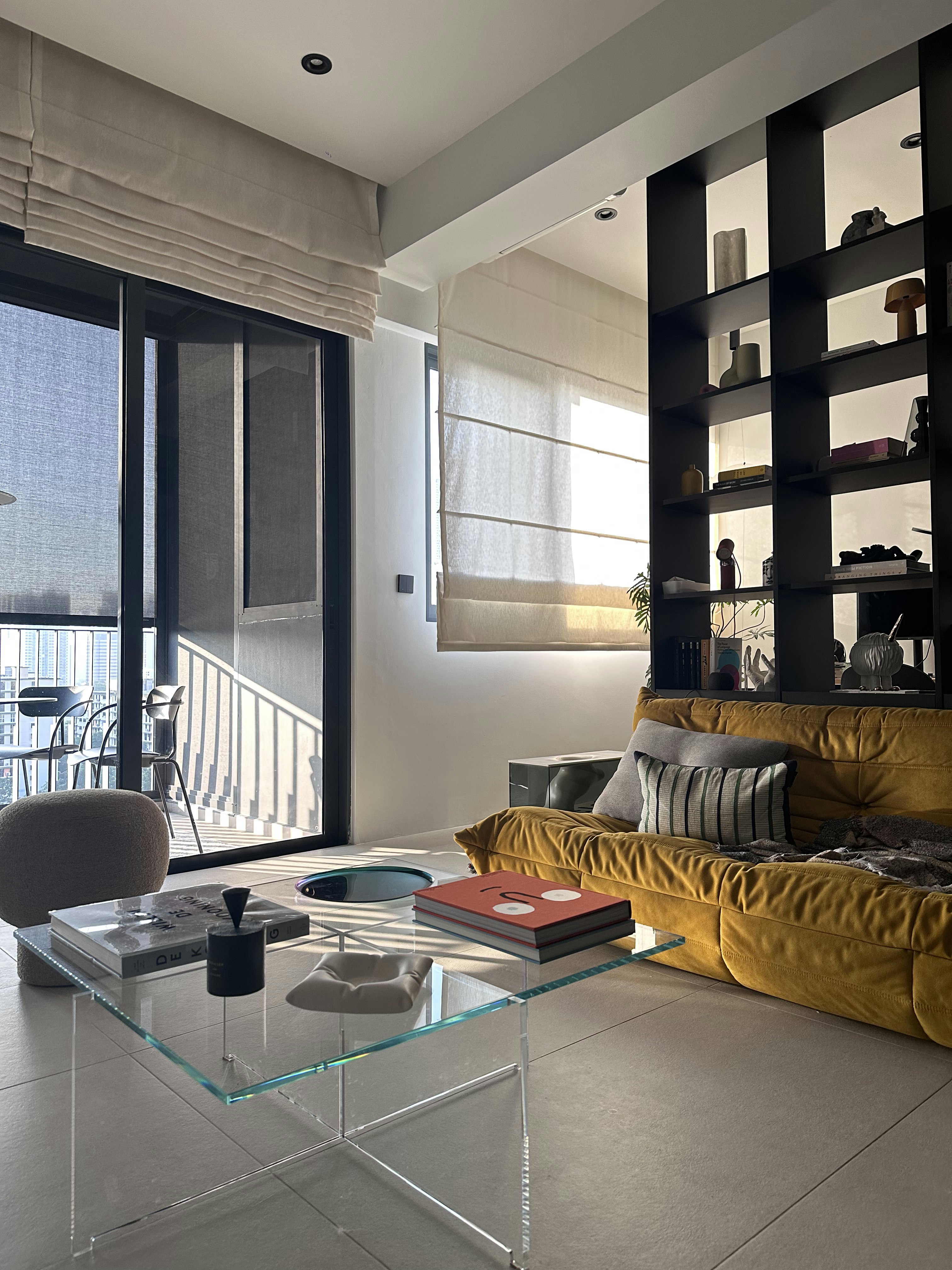 A Chic Modern Apartment Filled with Colors and Objects - Modern living room, minimalist design, large windows, natural light