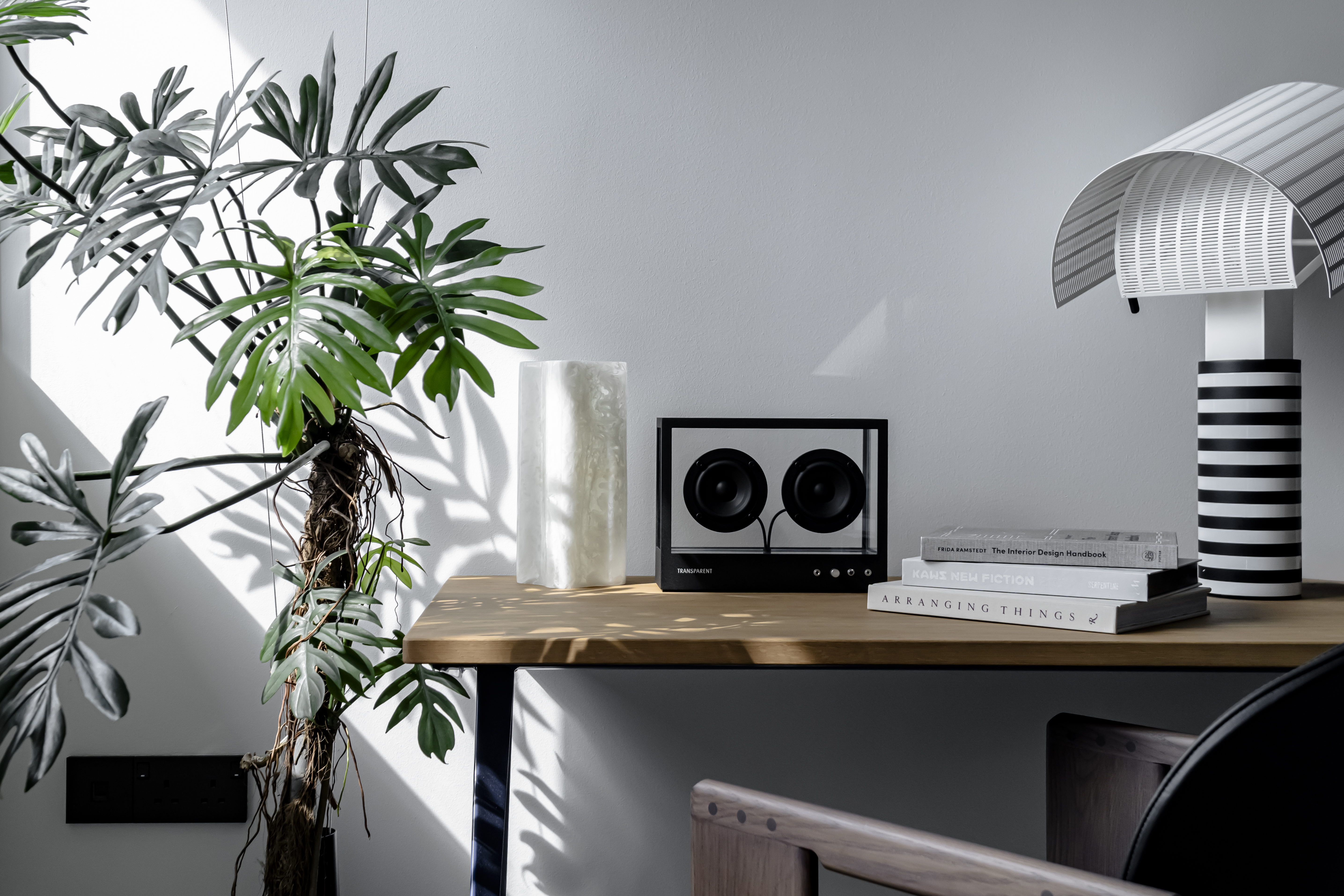 A Chic Modern Apartment Filled with Colors and Objects - Modern minimalist interior, sleek furniture, abstract art, natural