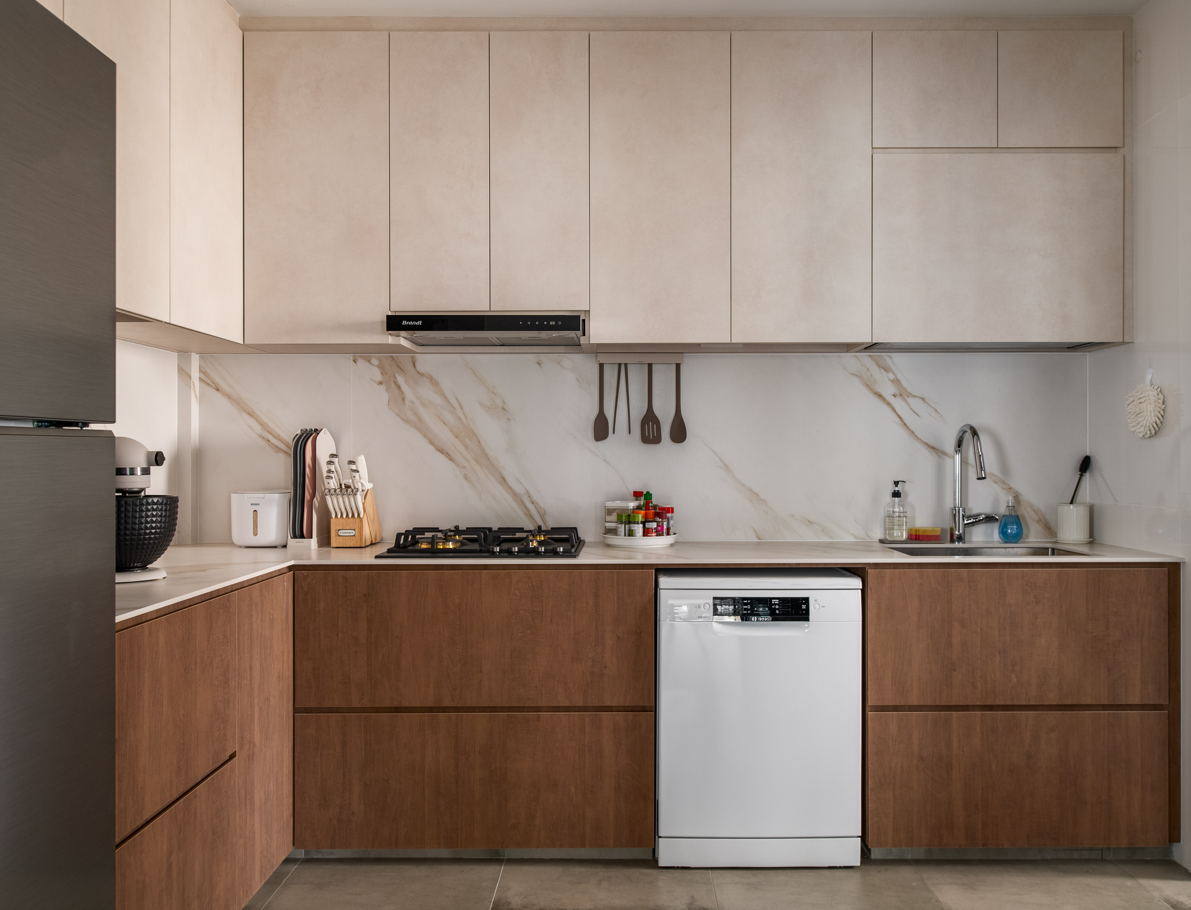 The chosen one! (How we chose our unit) - Modern kitchen with sleek cabinets, stainless steel appliances, marble backsplash