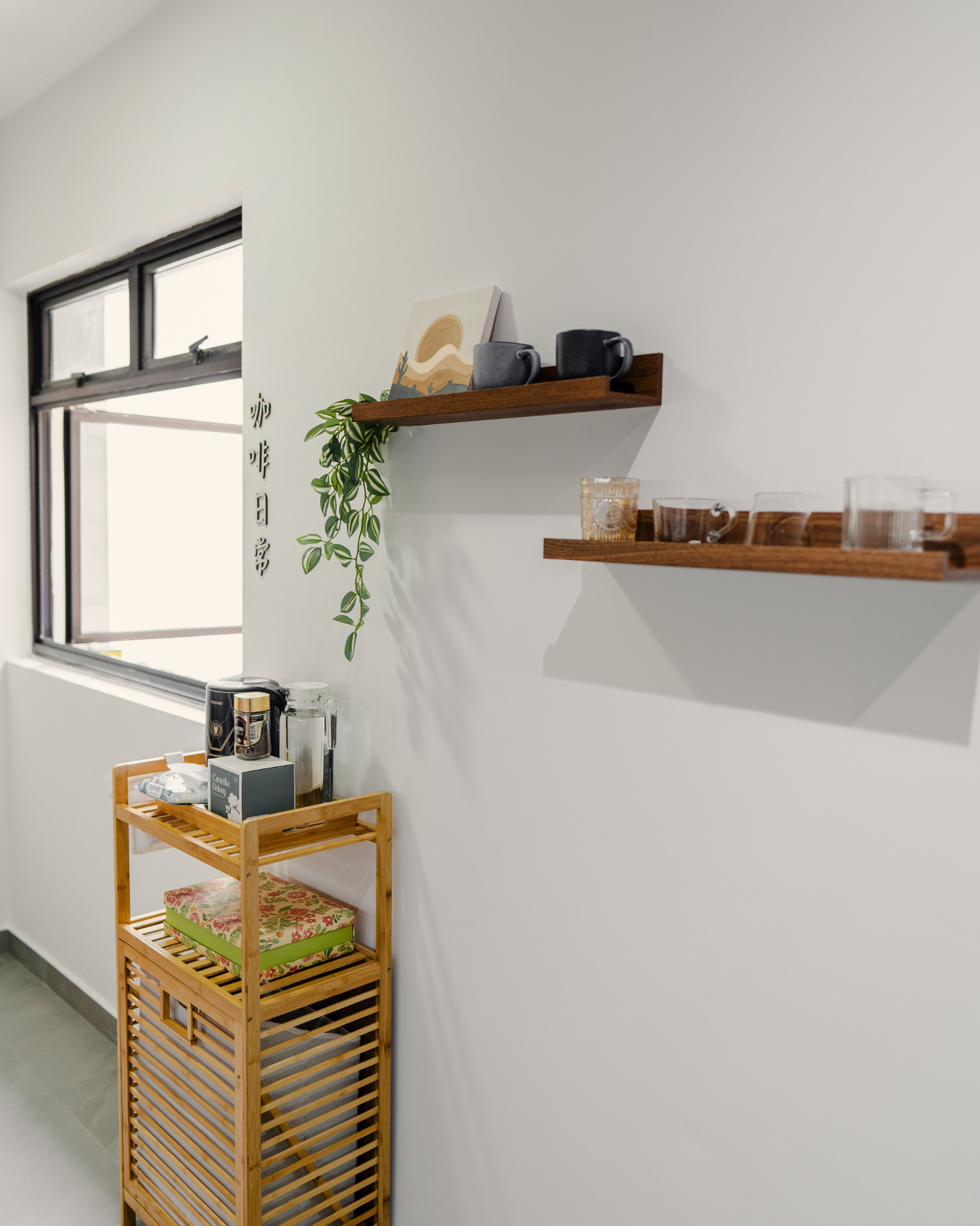 One Year Later – Our Experience & Transformation - coffee shop, modern decor, minimalist design, cozy corner, wooden shelves