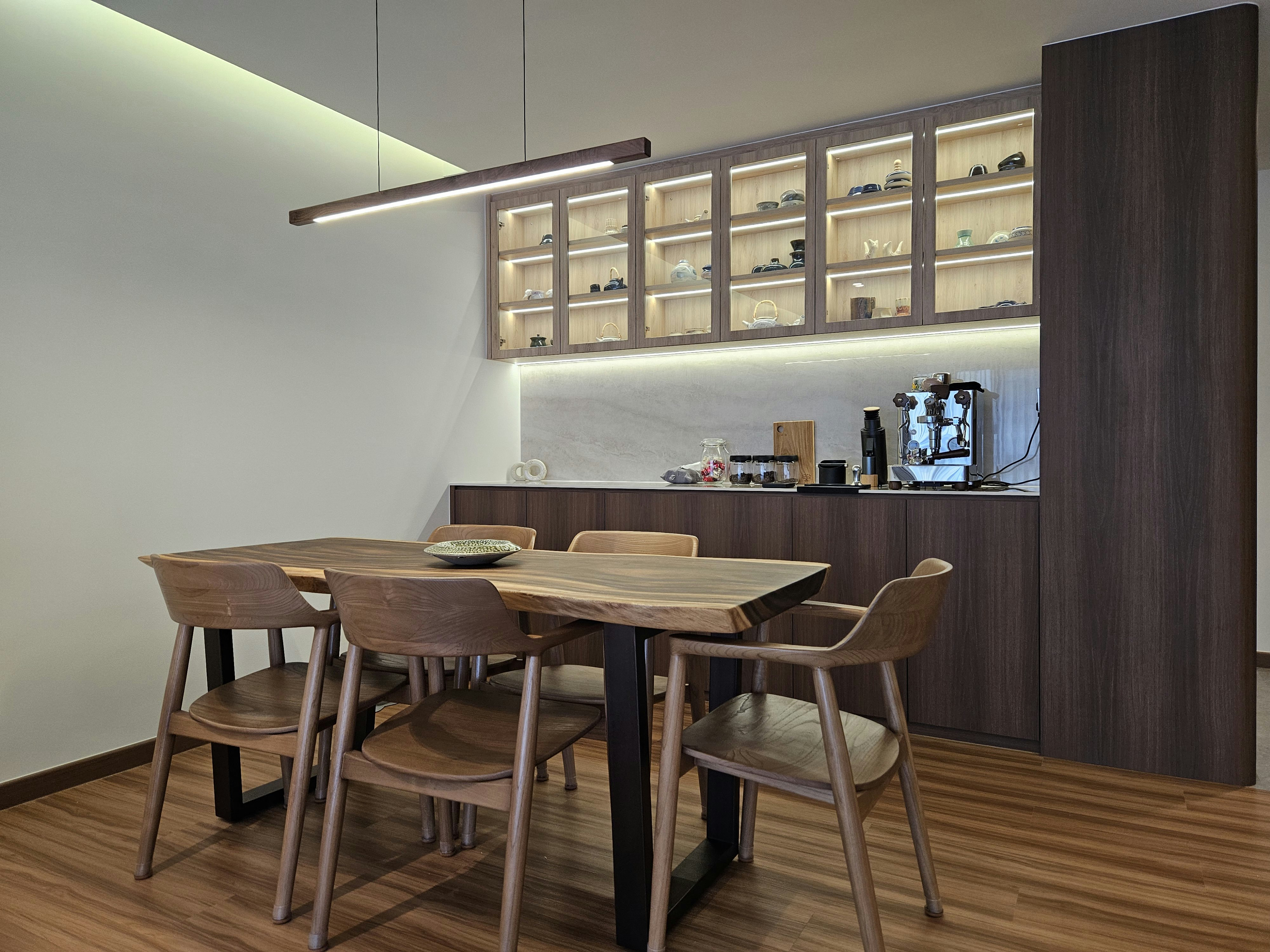 Step into our wood and pottery-filled 5-Room BTO - Wooden dining table, modern kitchen, minimalist design, wooden chairs