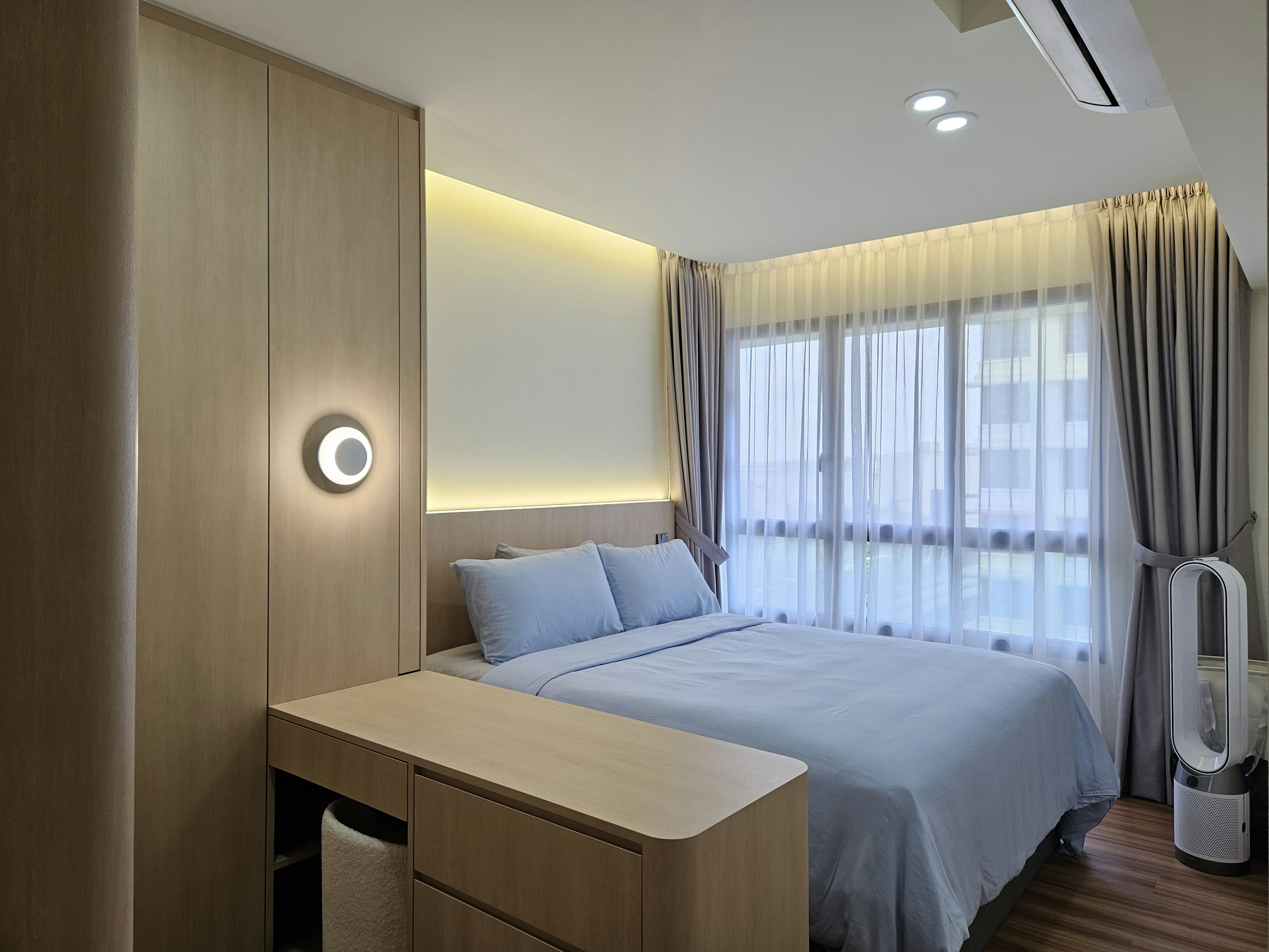 Step into our wood and pottery-filled 5-Room BTO - Wooden bedroom with modern design, large bed with blue bedding, soft