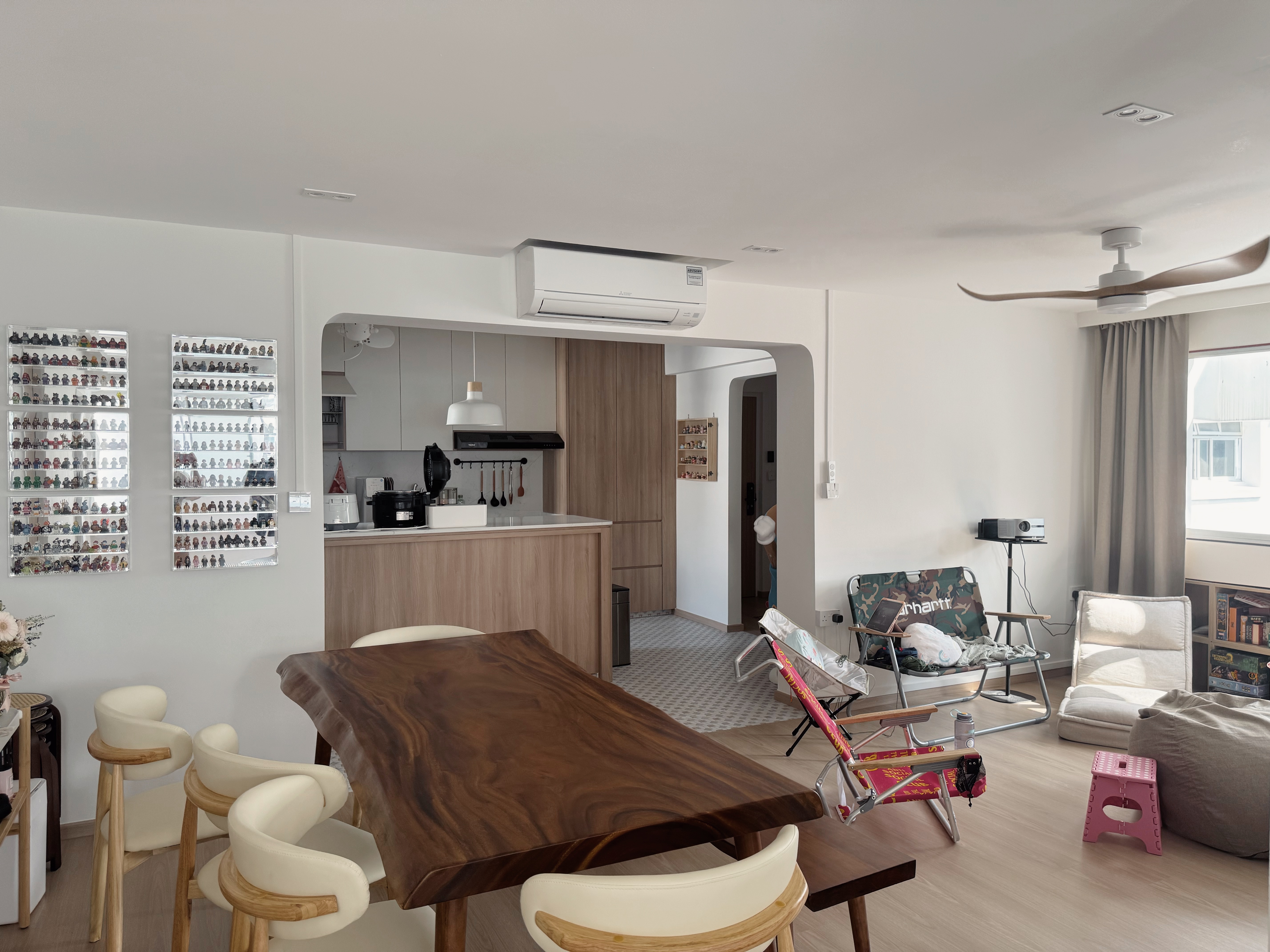 Our $85k renovation to house our toy collection & museum!  - Modern kitchen with wooden cabinets, white ceiling fan, and