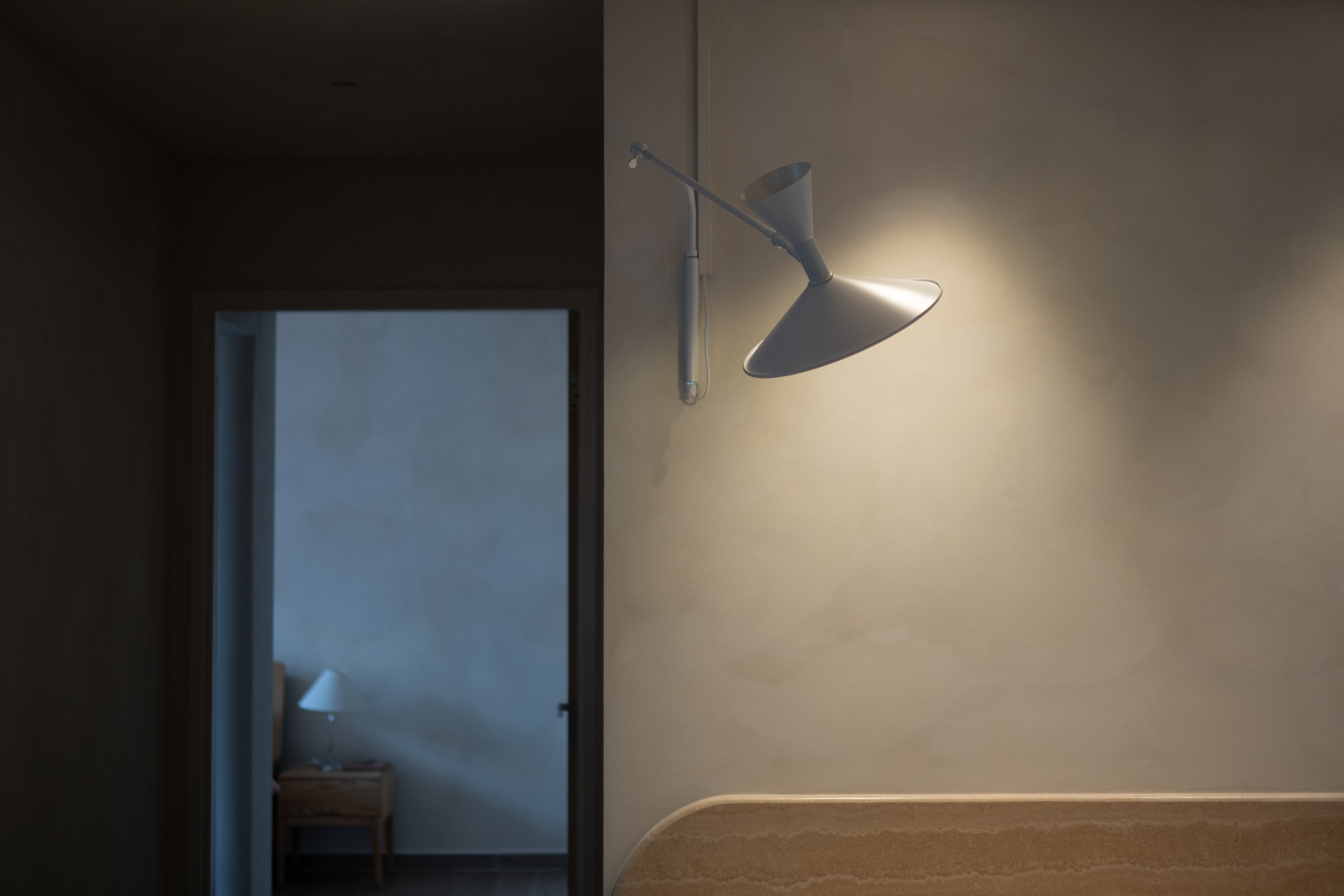 Inside our $45k Limewashed Reno Home: Minimalist Mid-Century Modern  - Modern minimalist room, soft lighting, sleek lamp