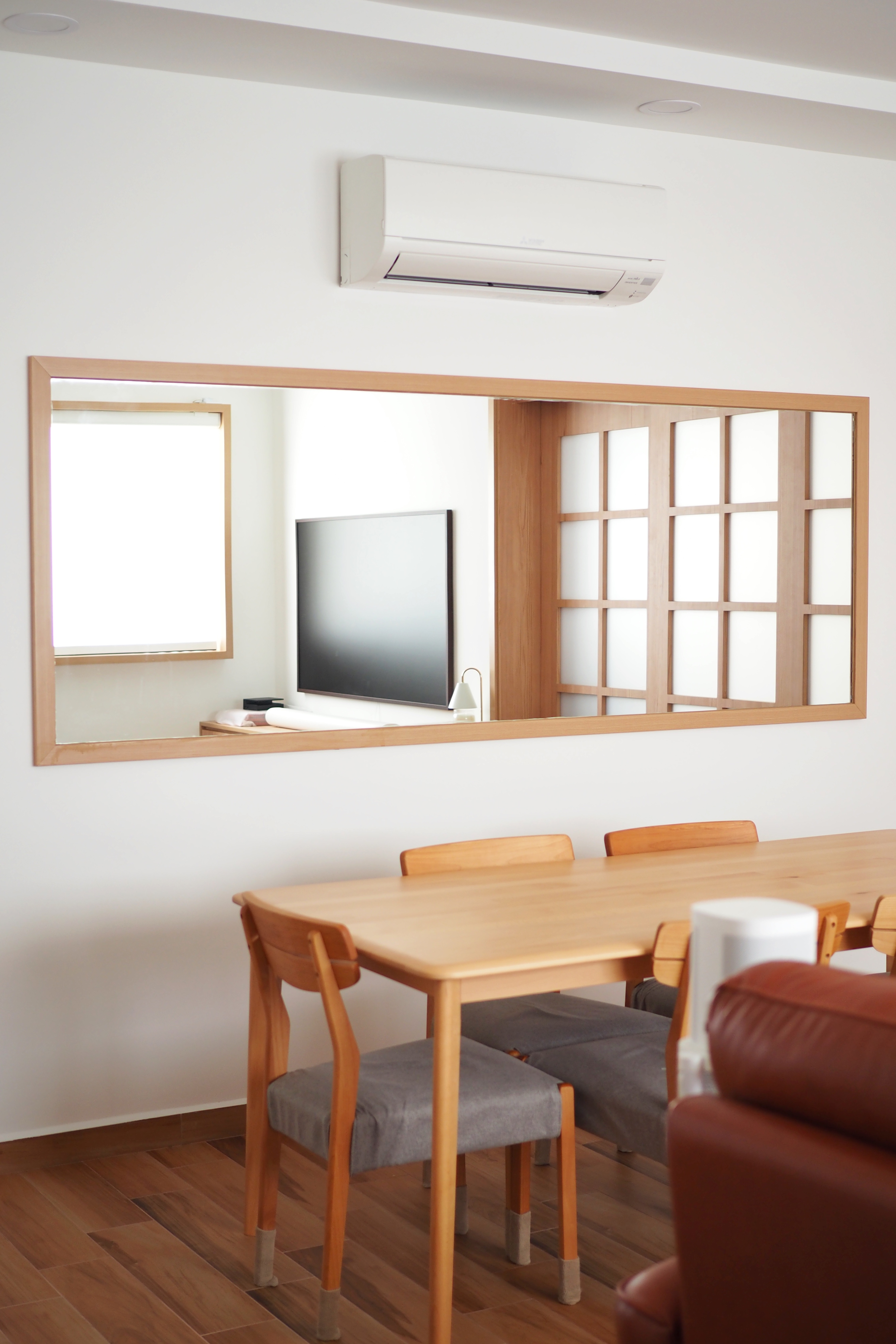 From (sketch) renders to reality - Modern minimalist dining room, wooden dining table, gray upholstered chairs, white air